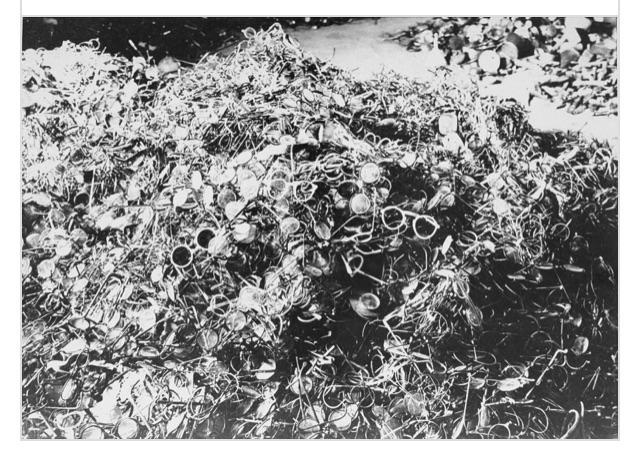 A haunting mountain of eyeglasses collected from Jewish individuals before their tragic fate in the gas chambers at Auschwitz