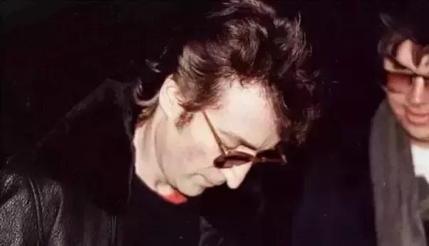 A Haunting Snapshot: John Lennon and Mark David Chapman Just Hours Before Tragedy