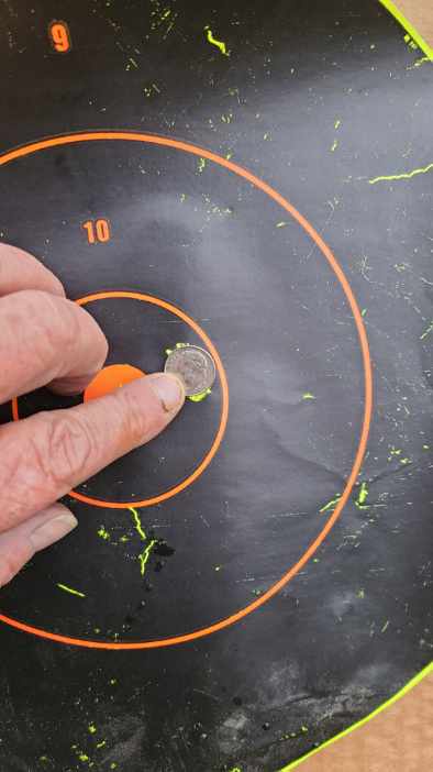 Nailed it: .308 caliber, 3 shots at 100 yards.