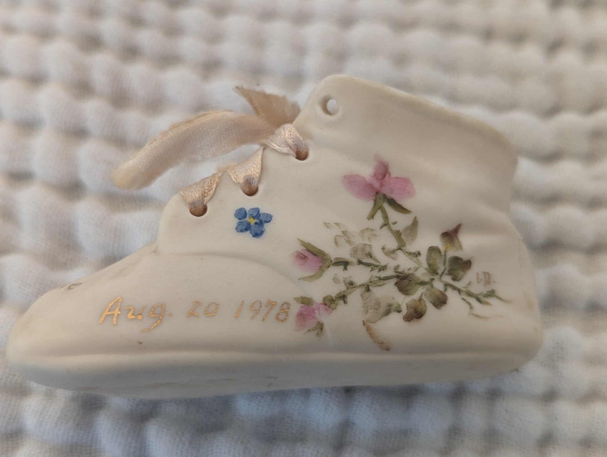 Rediscovered my cherished baby shoe keepsake.