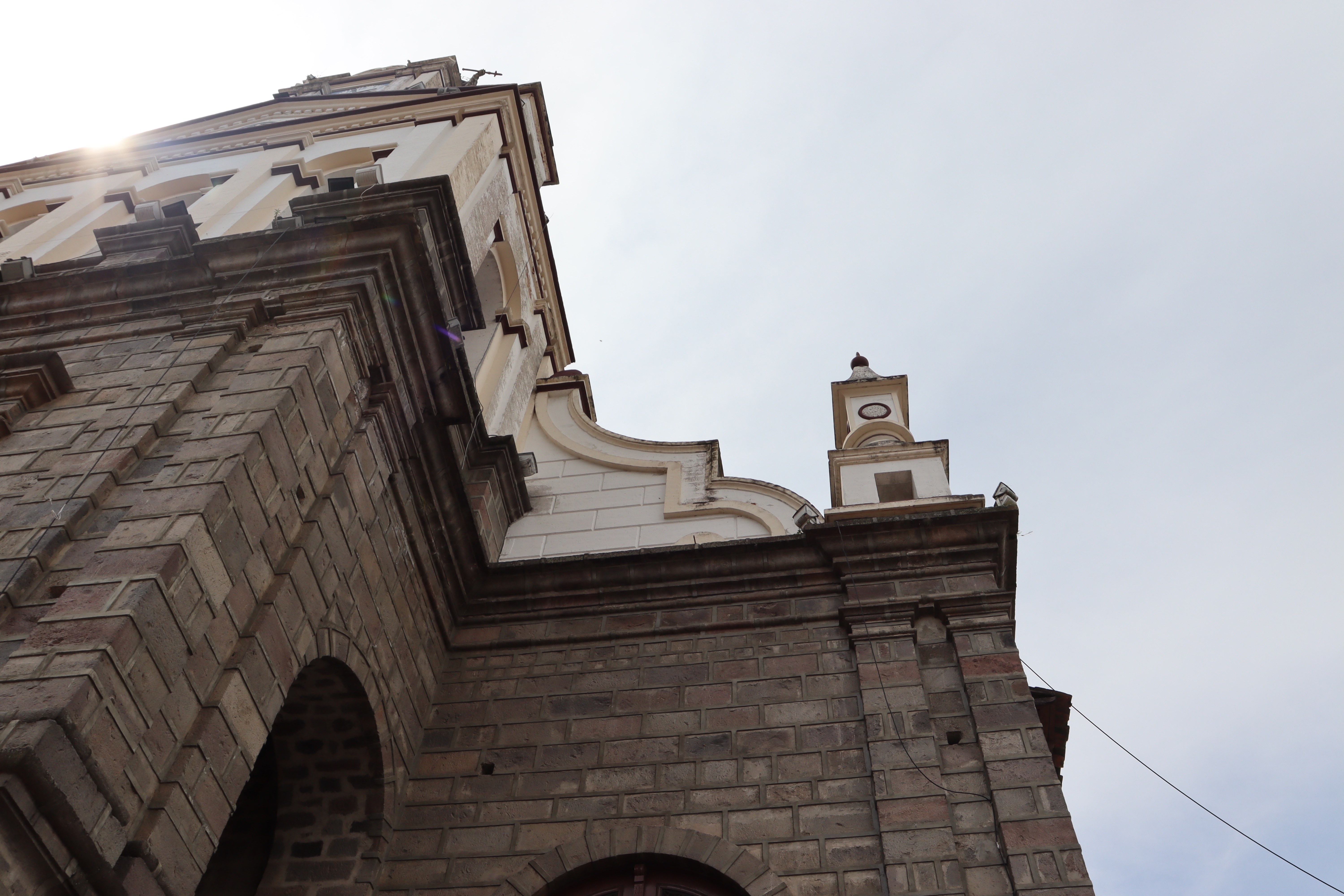 A breathtaking view of the sky meeting the majestic church.