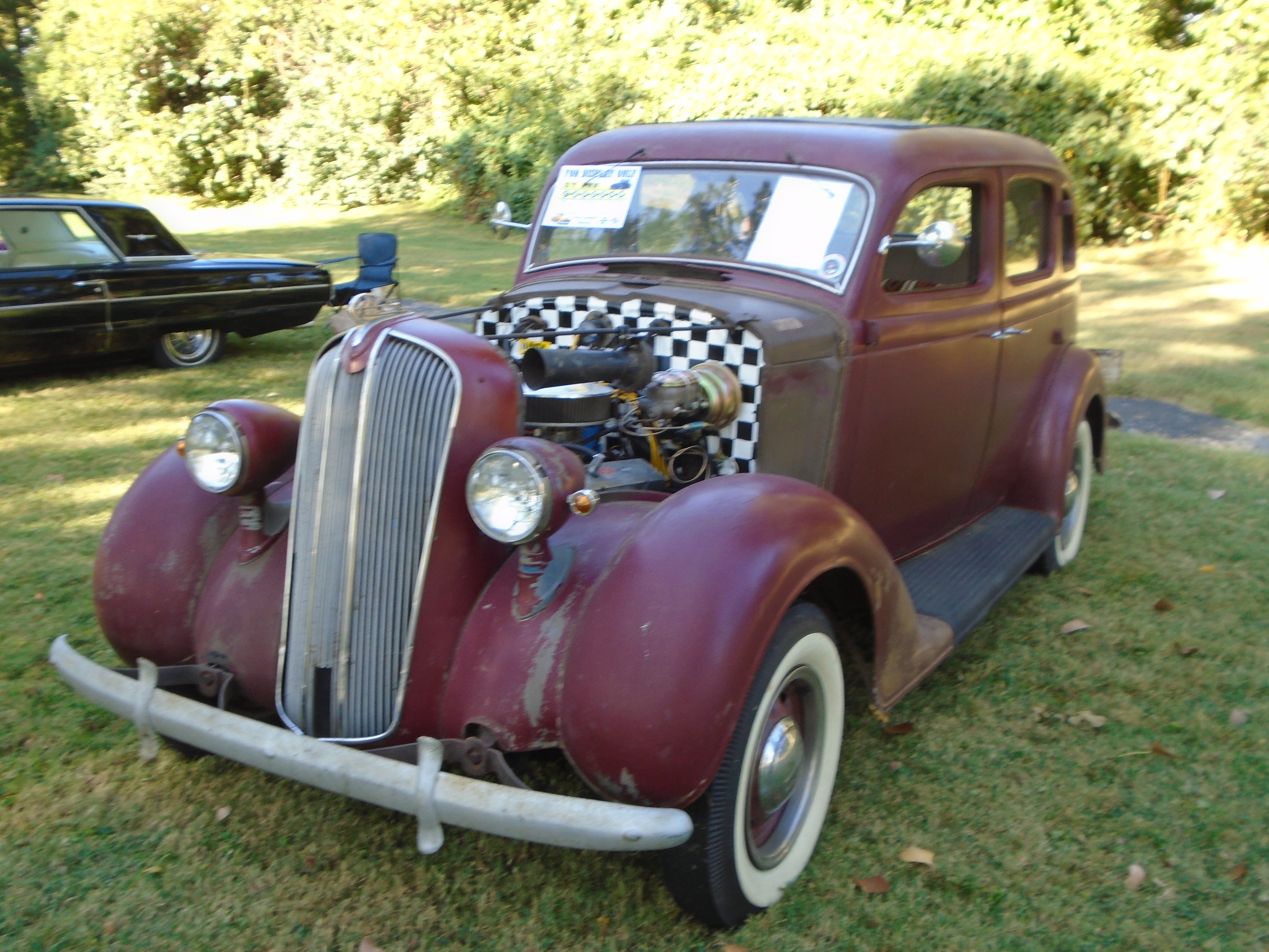 Behold the classic 1936 Plymouth Deluxe Four Door Touring Sedan.