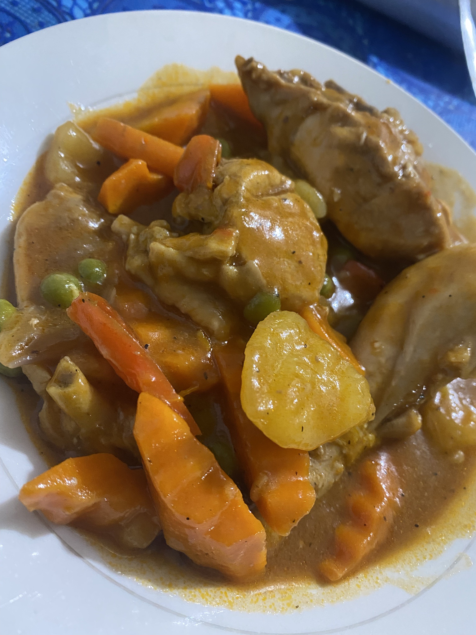 Delicious Chicken in Tomato Sauce with Peas, Potatoes, and Red Bell Pepper – Yum!