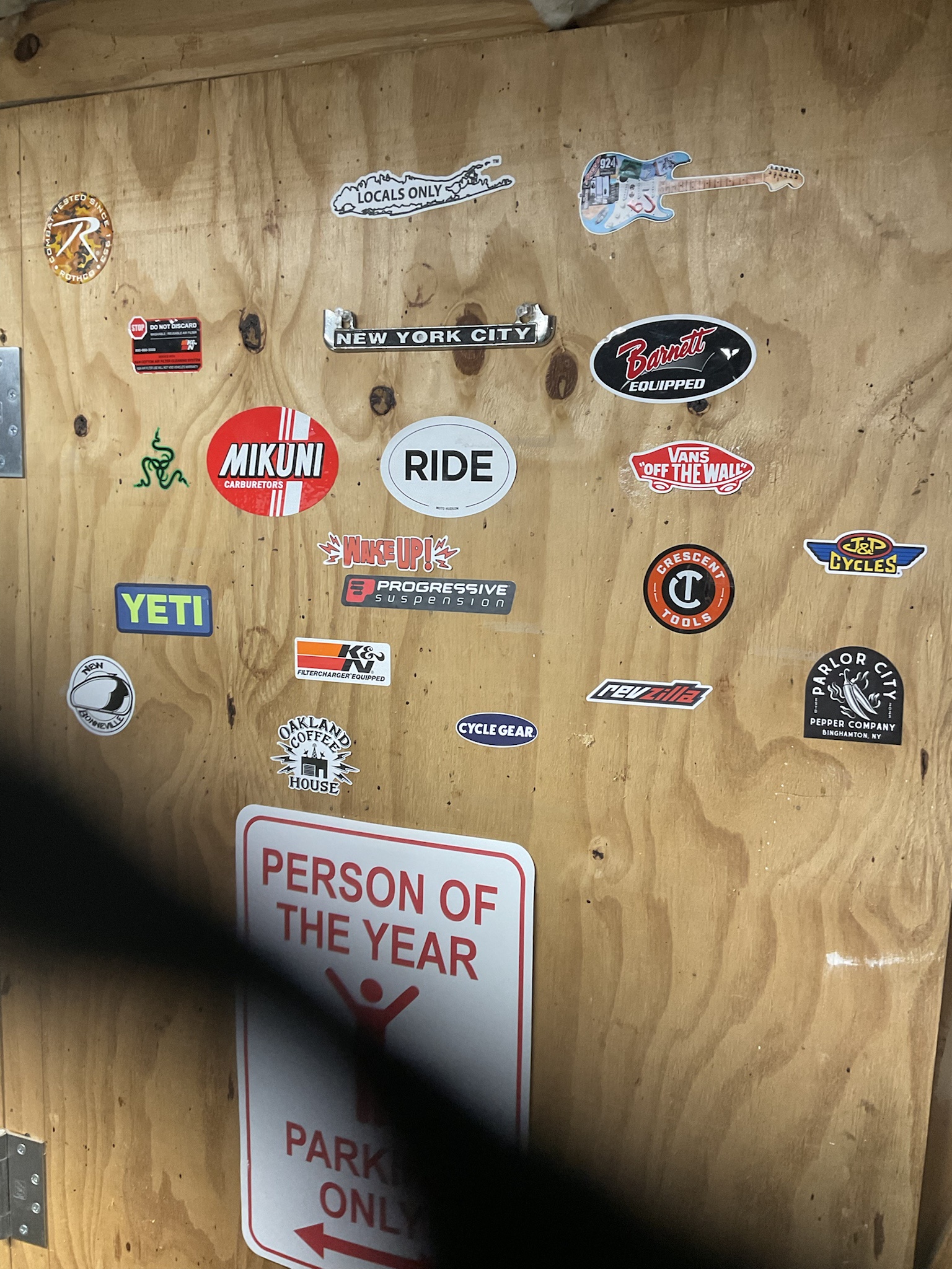 My workshop door: the ultimate sticker showcase