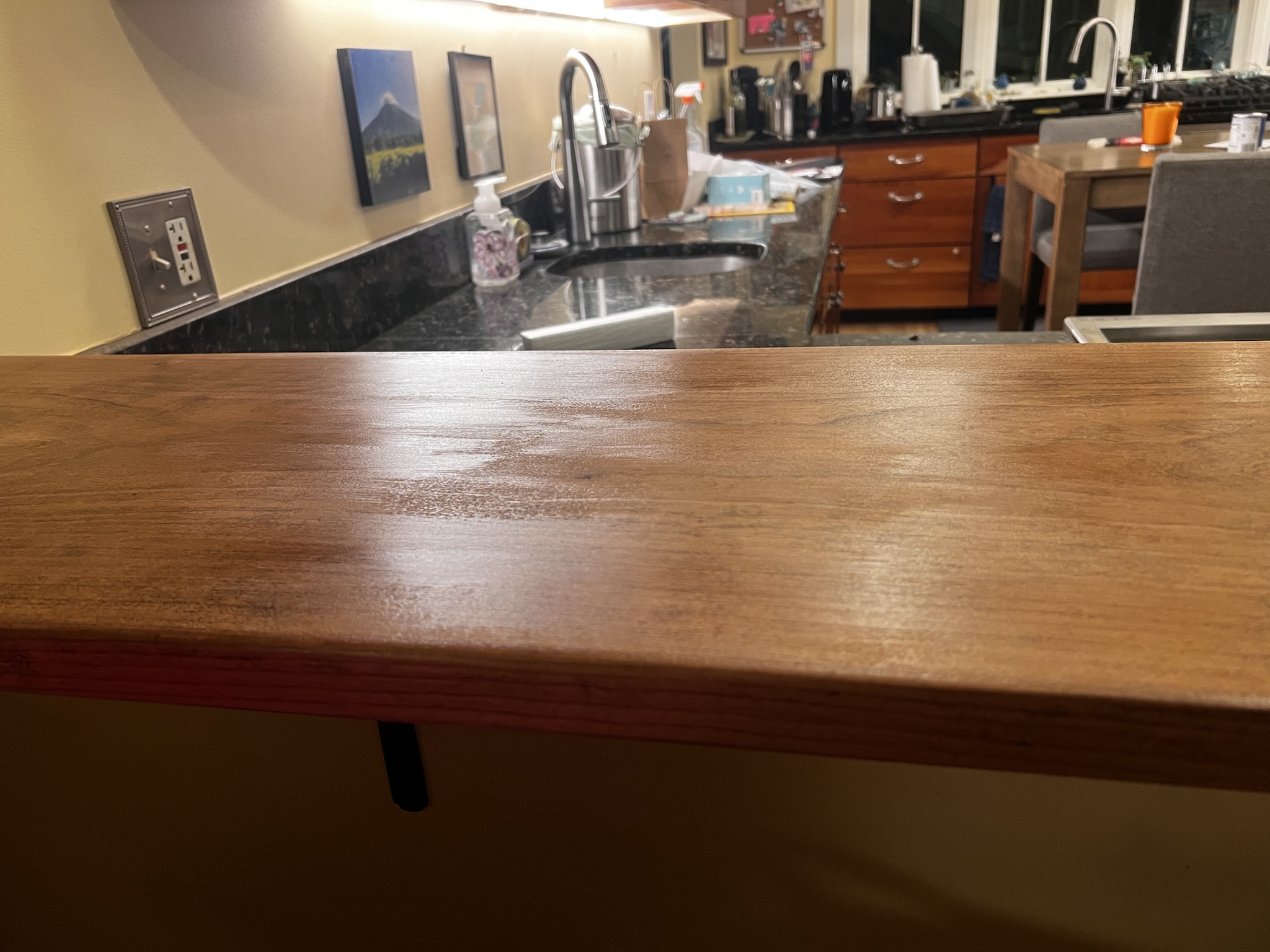 I applied one coat, but now it's all messed up. Should I just layer on another coat or start from scratch and sand it down?