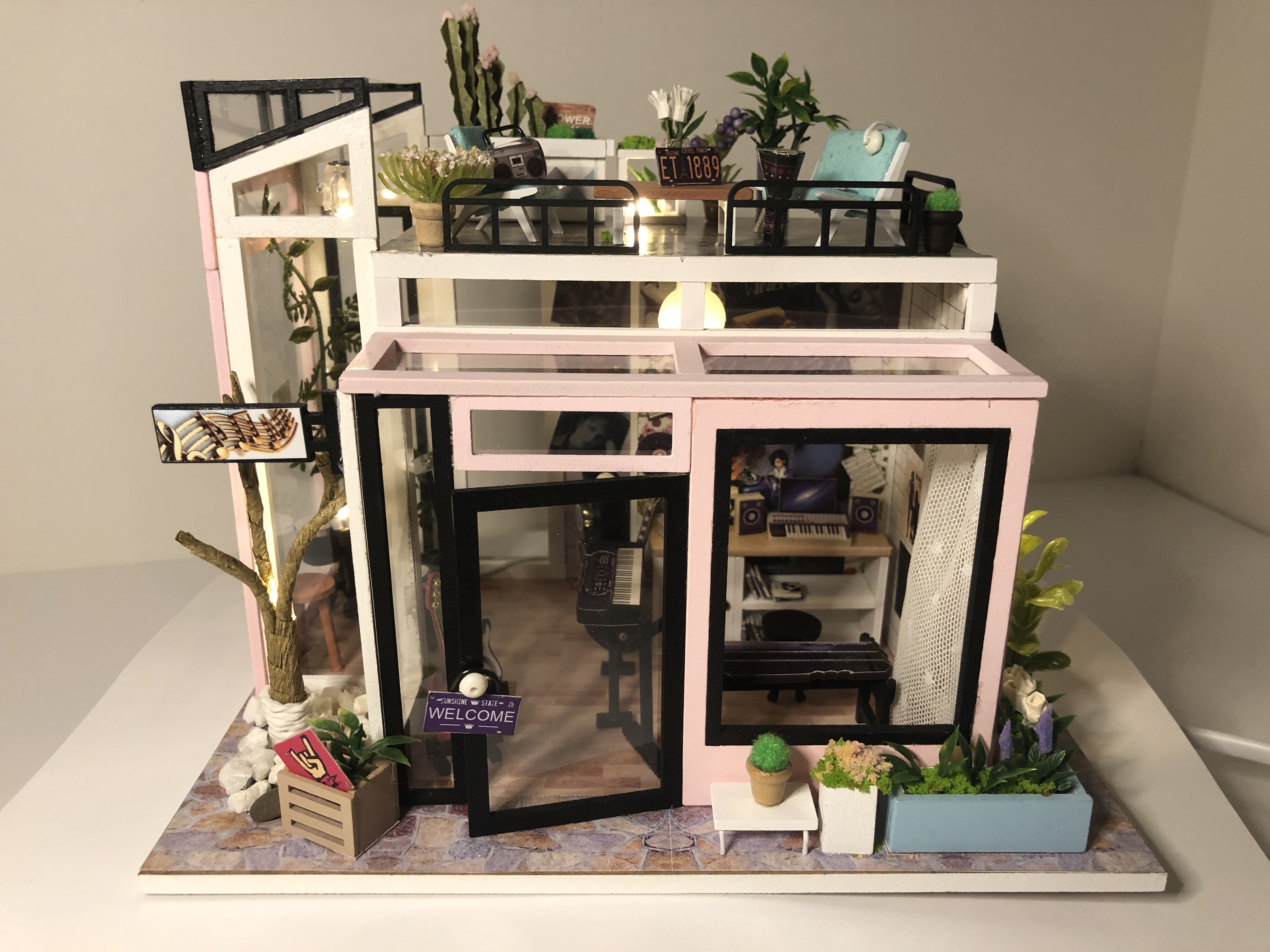 Explore the Charm of a Miniature Music Studio with Unique Custom Touches