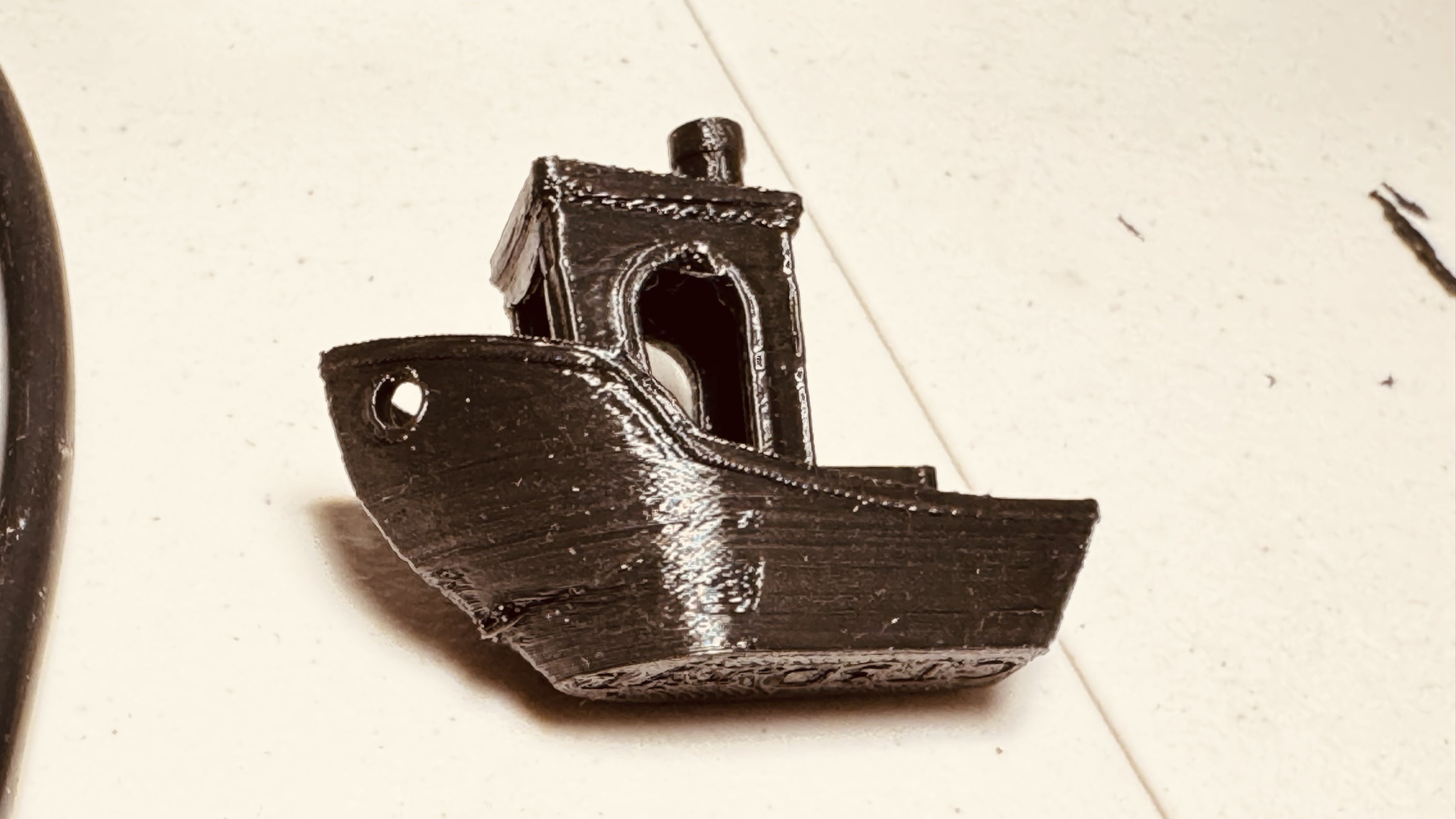 Check out my latest 3D print! Any advice for improvement? I think my old filament might be causing some issues.