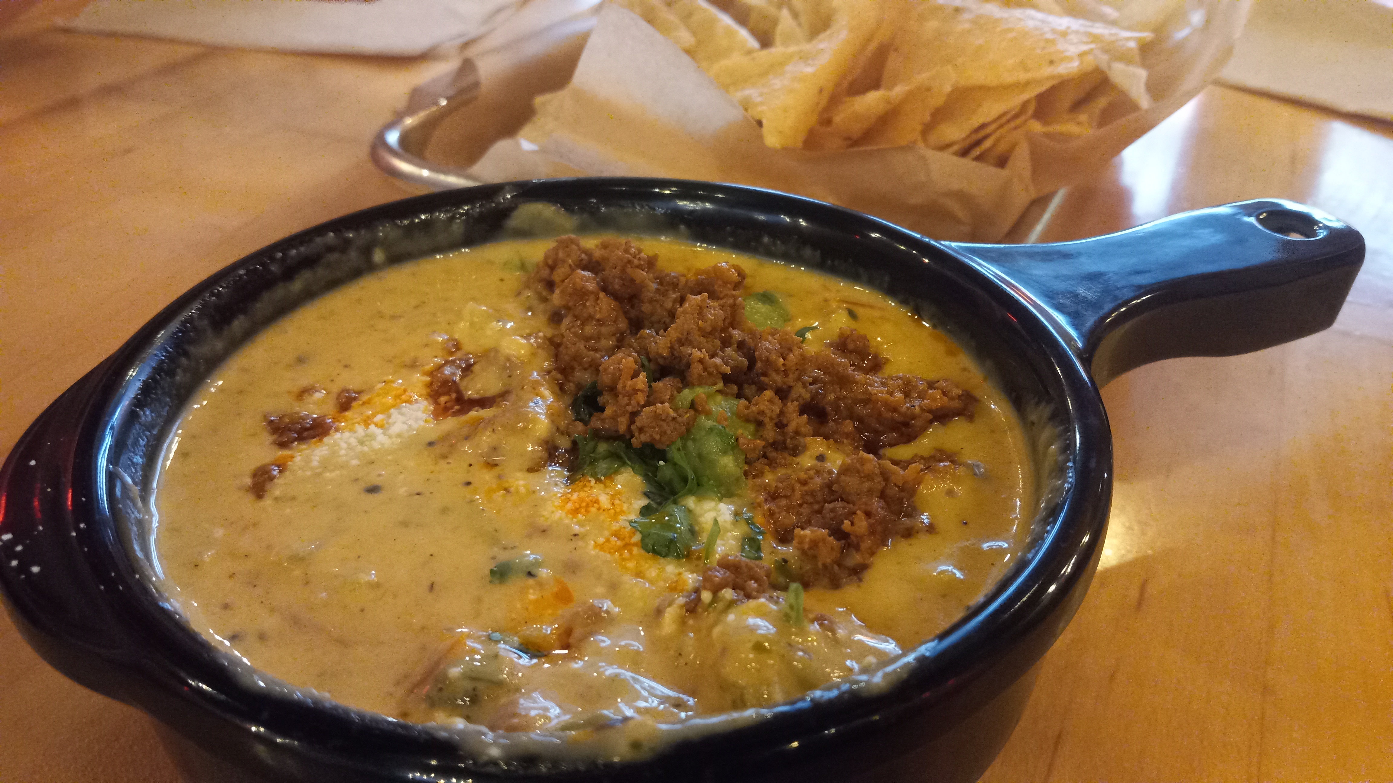 Indulging in Torchy's mouthwatering queso