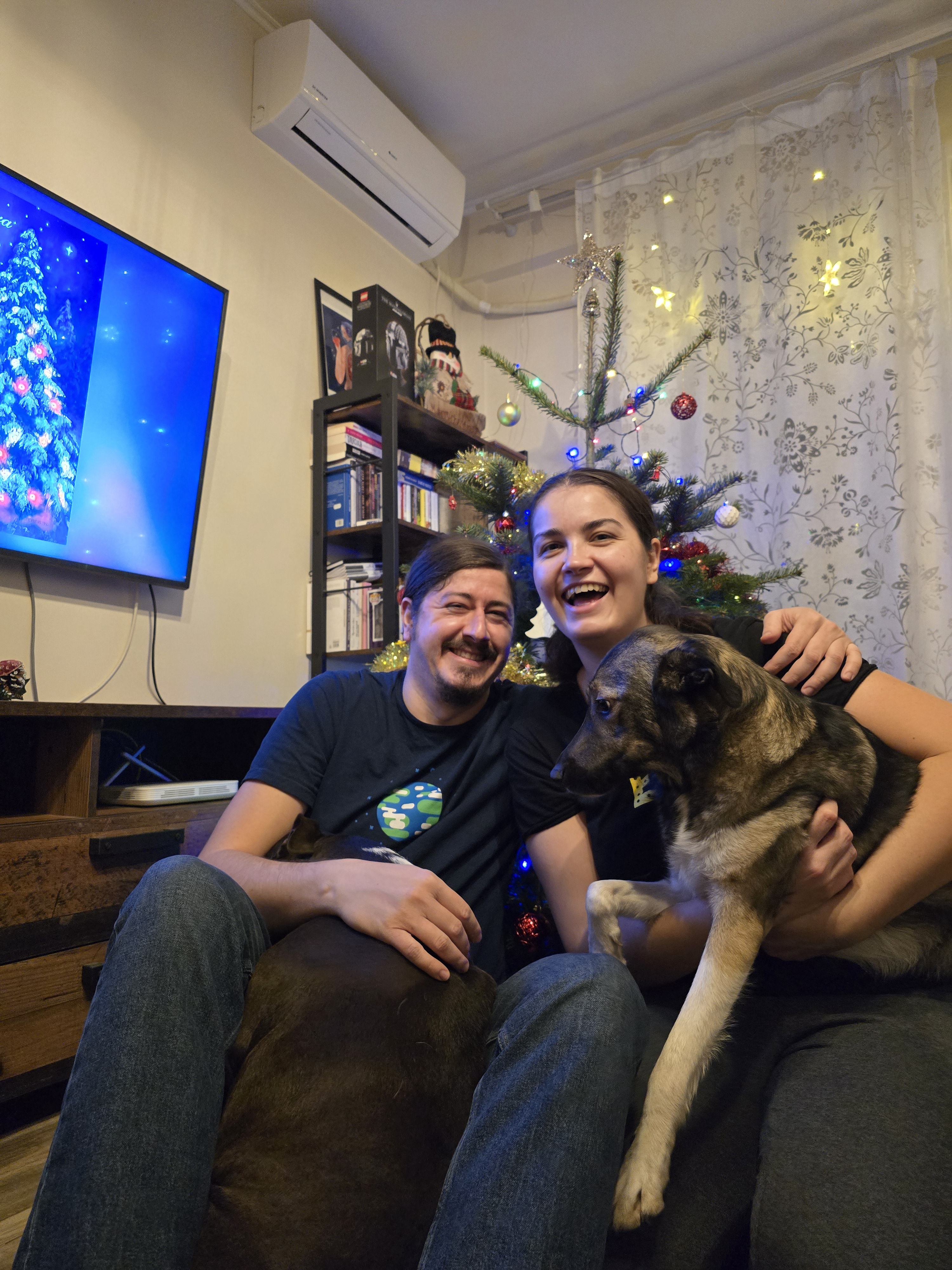 Christmas selfie with my fiancée and our adorable doggos!