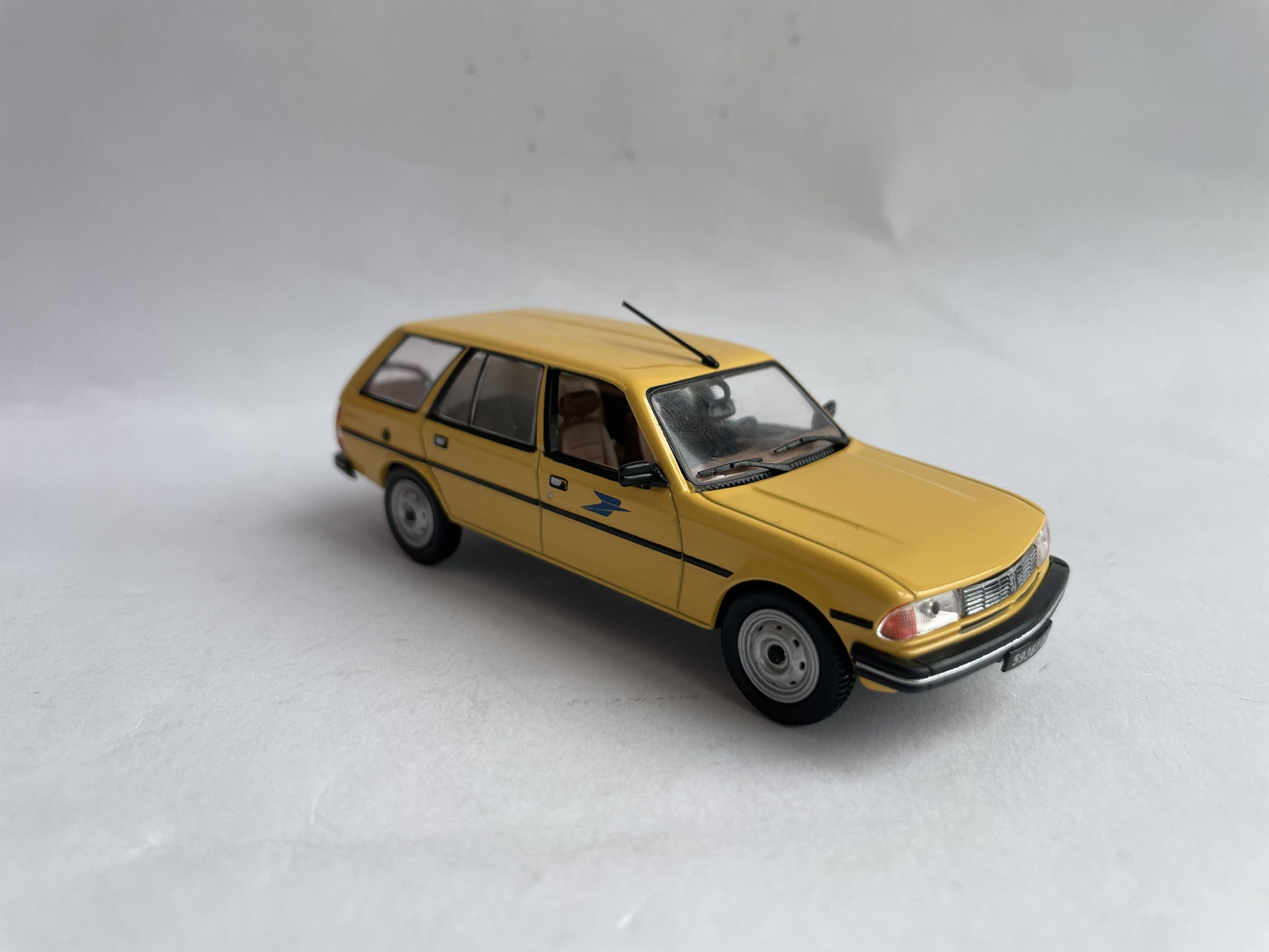 A Closer Look at the 1983 Peugeot 305 Break and Its 1979 Counterpart