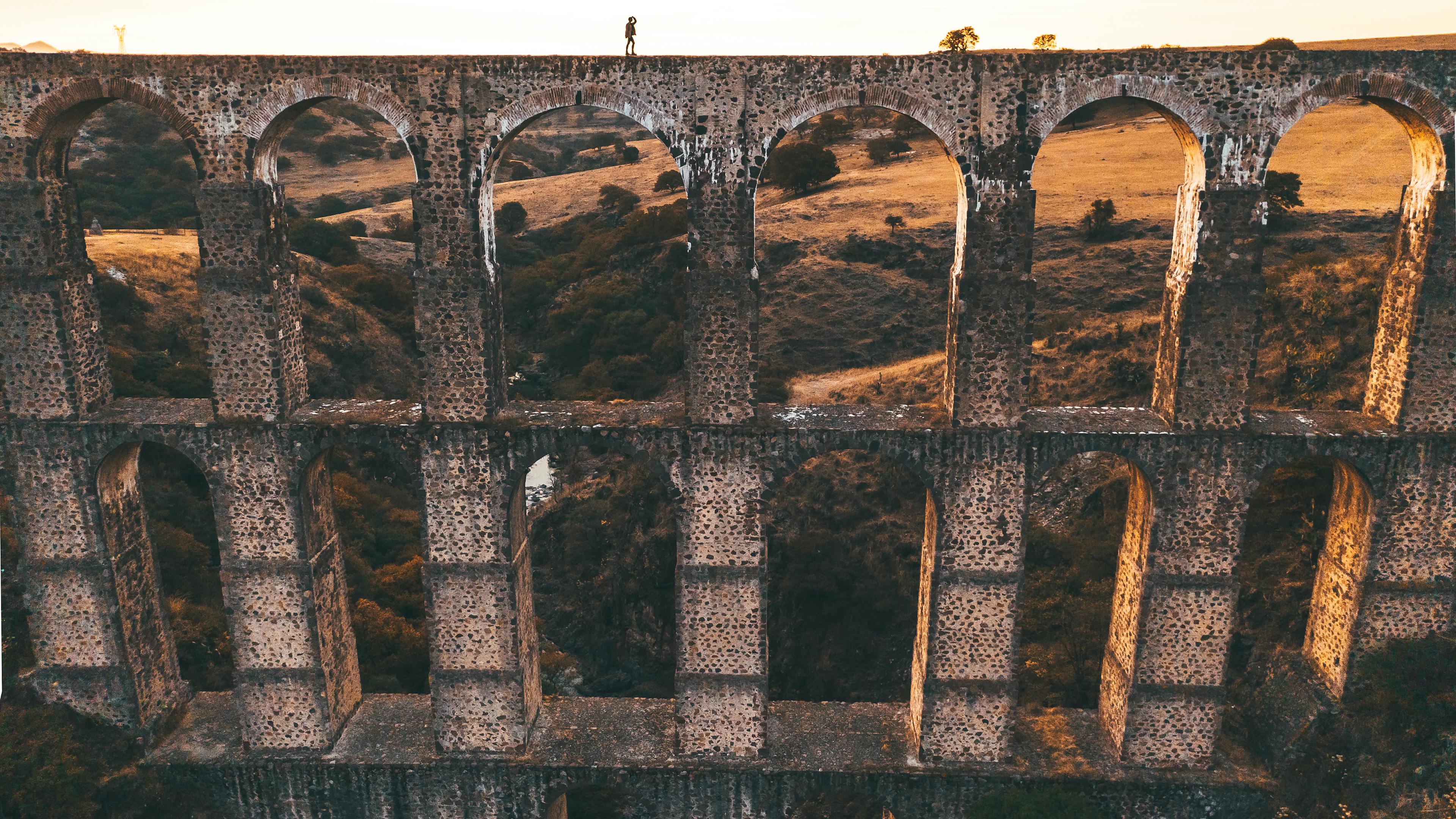 Breathtaking Sunset Over Ancient Aqueducts