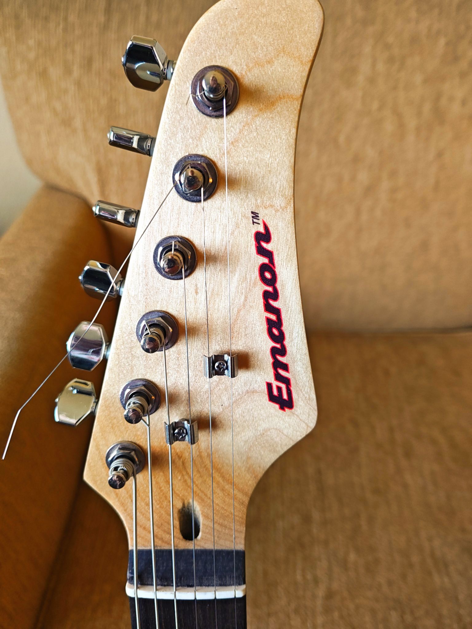 Custom Glarry GTL headstock featuring a homemade logo—because the original was just not cutting it.
