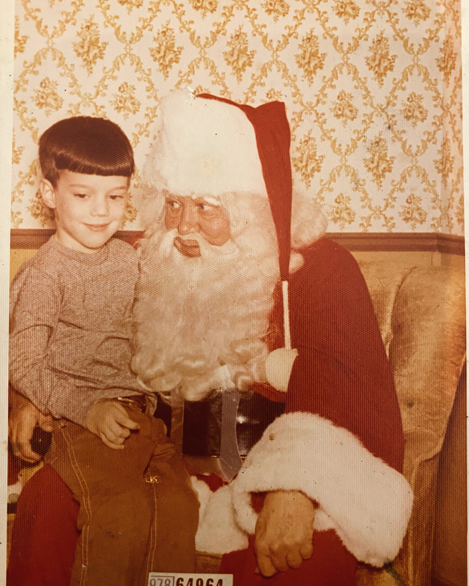 Throwback to the early 70s: Bowl cut and a visit to Santa!