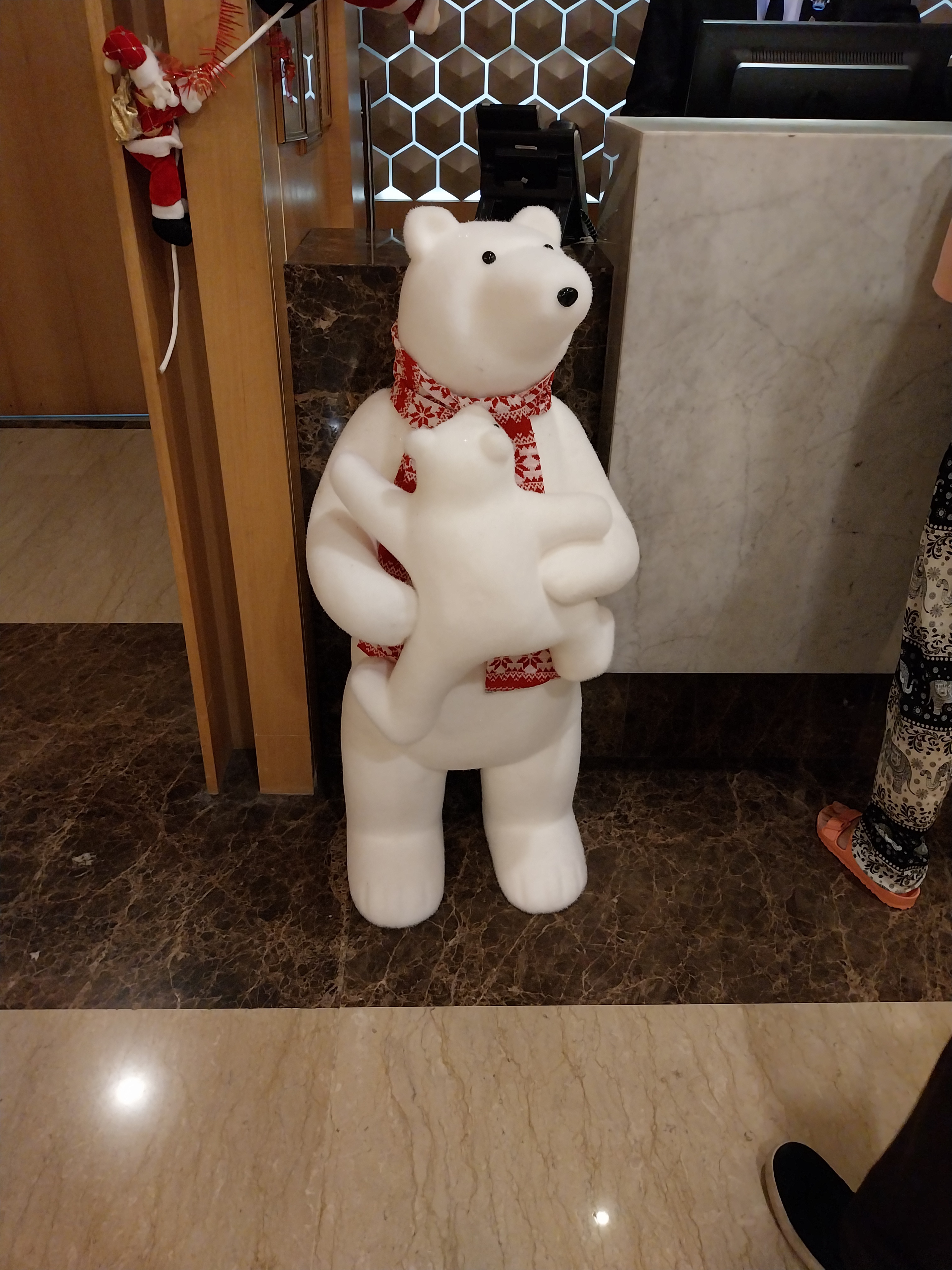 A Festive Polar Bear Enjoying Hotel Life