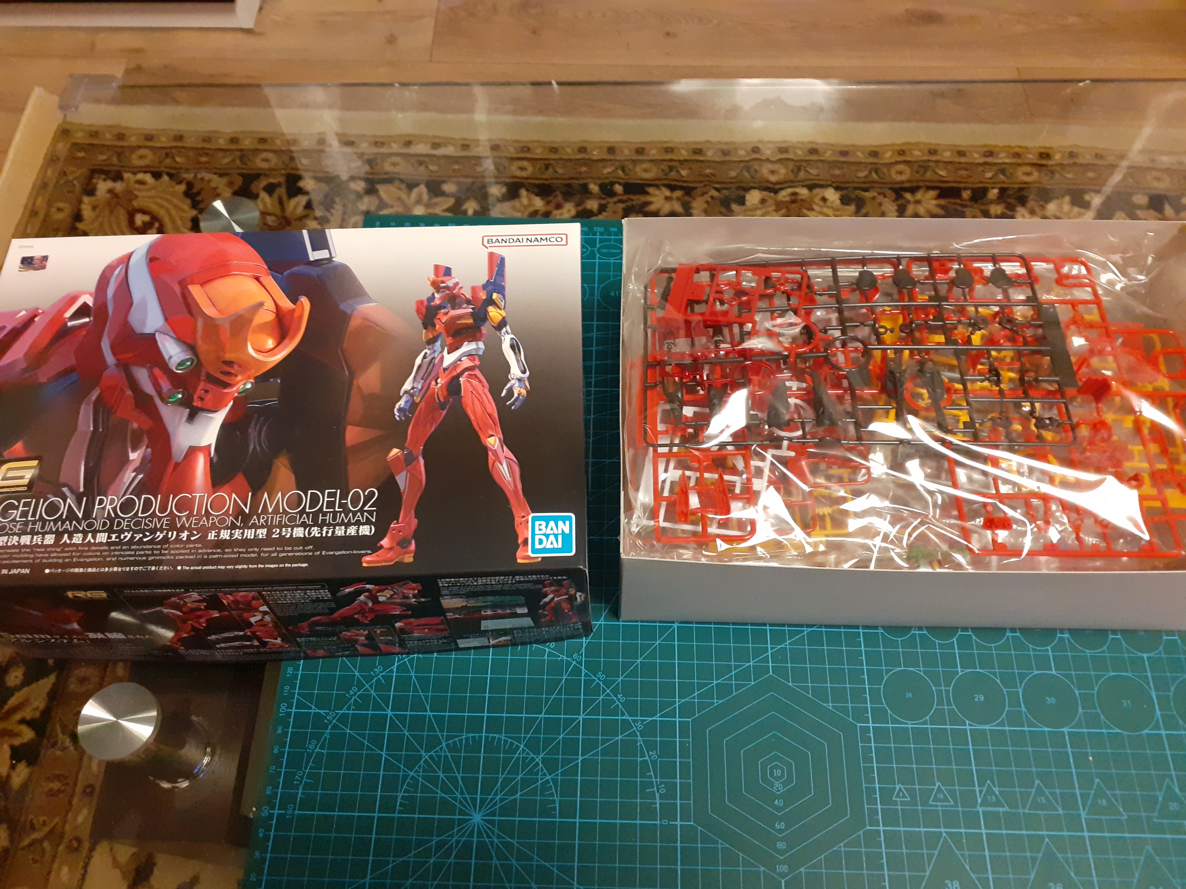 Watch the progress of building the Eva Model-02 RG Gunpla by Bandai!