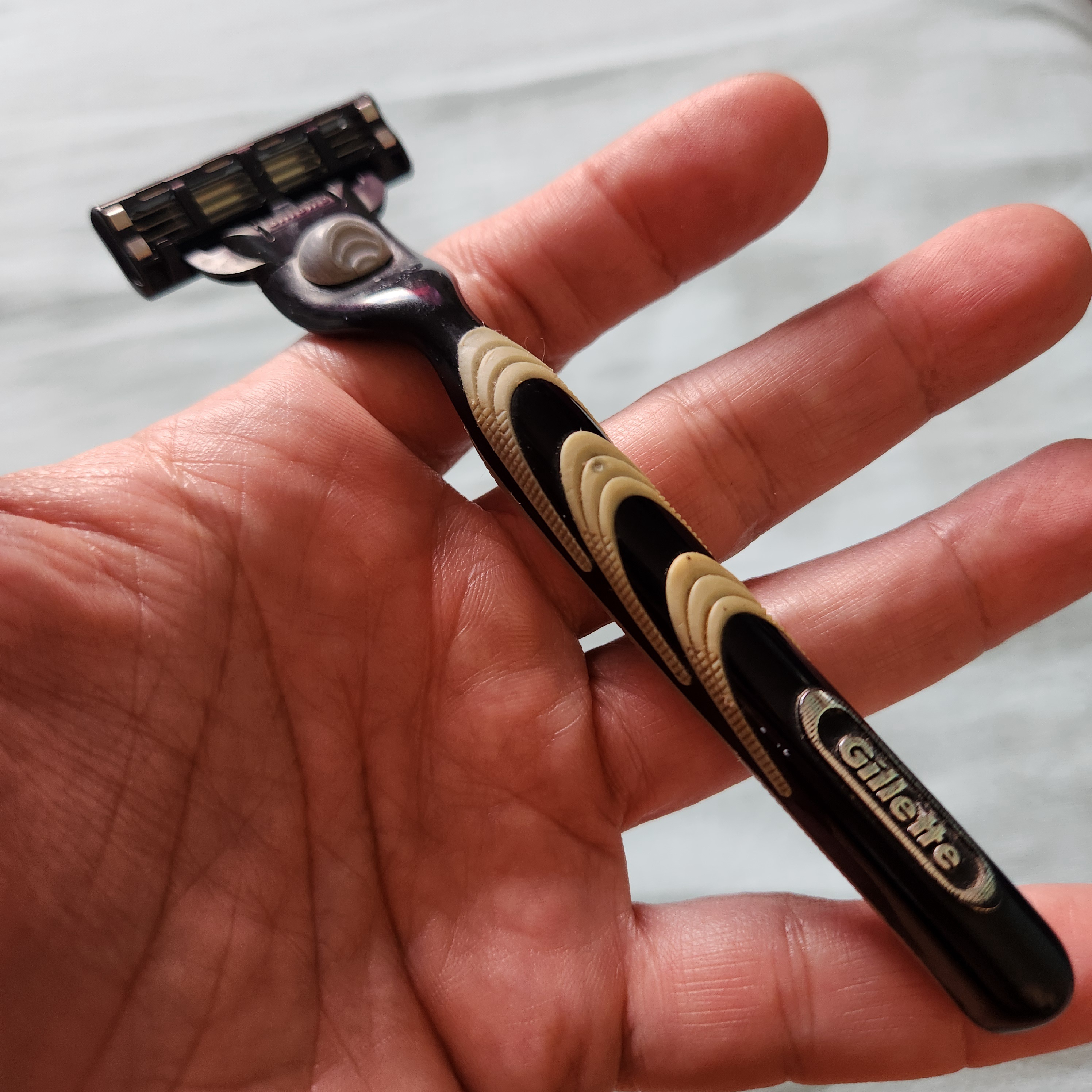 A vintage Gillette Mach 3 razor blade, still going strong after 25 years!