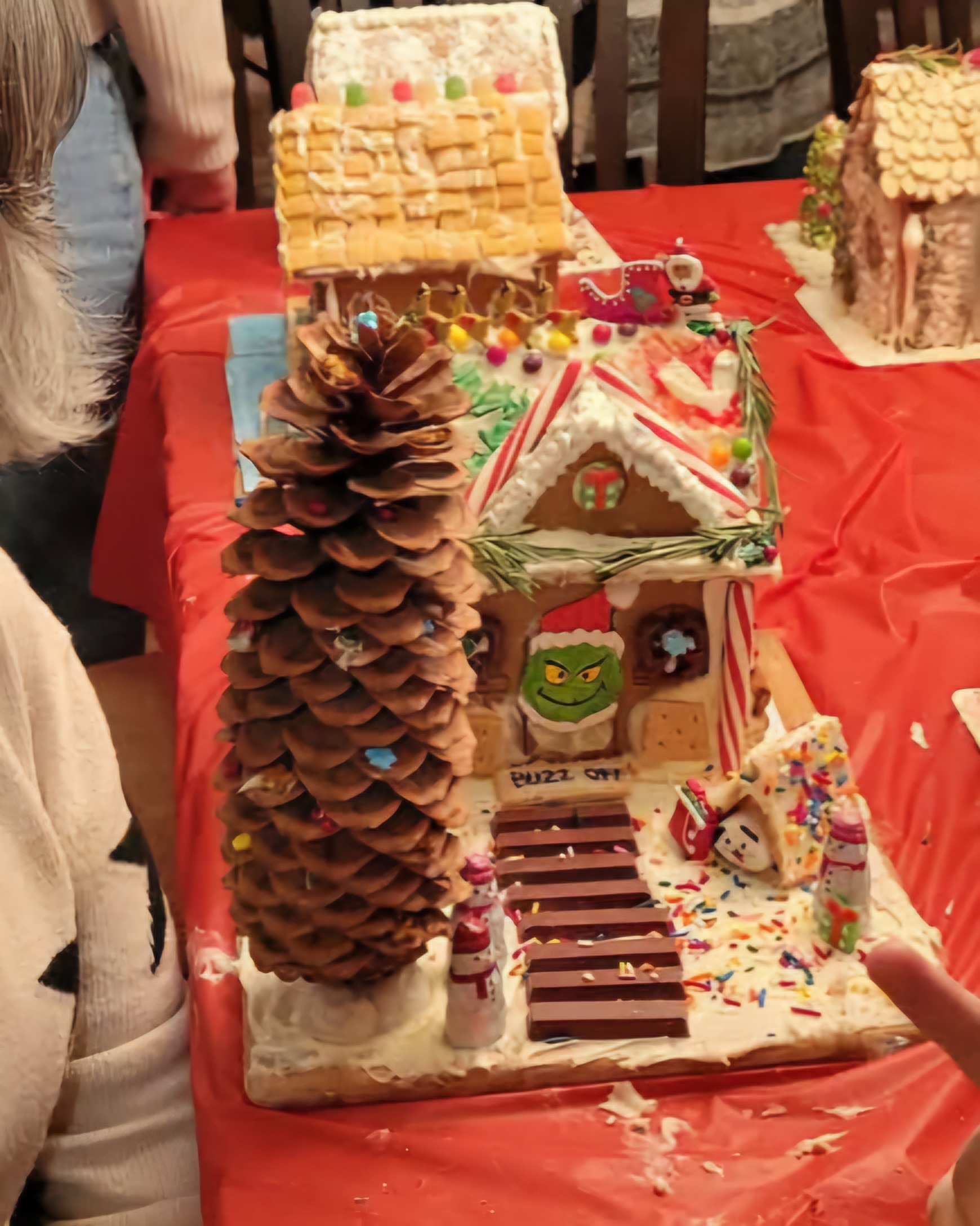 Check out this incredible pinecone, crafted in gingerbread house style!