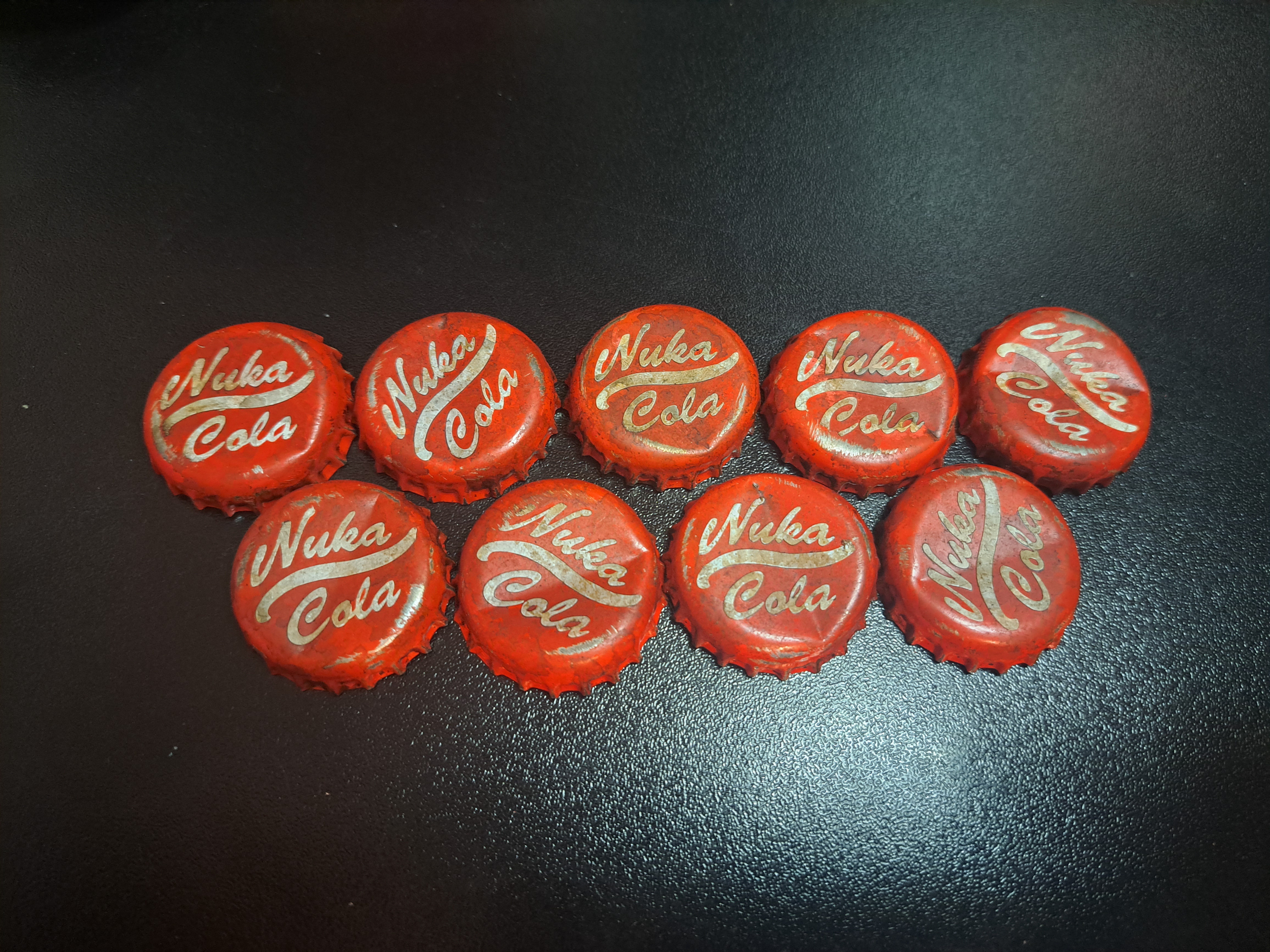 Just take my caps already! [Fallout Nuka Cola cap props]