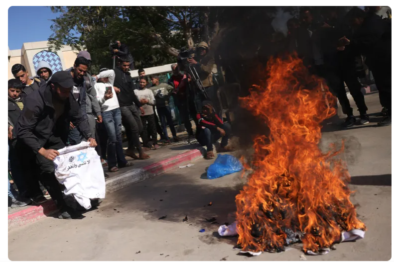 Freed Palestinians Burn 'Humiliating' Shirts: A Powerful Statement After Release from Israeli Prisons