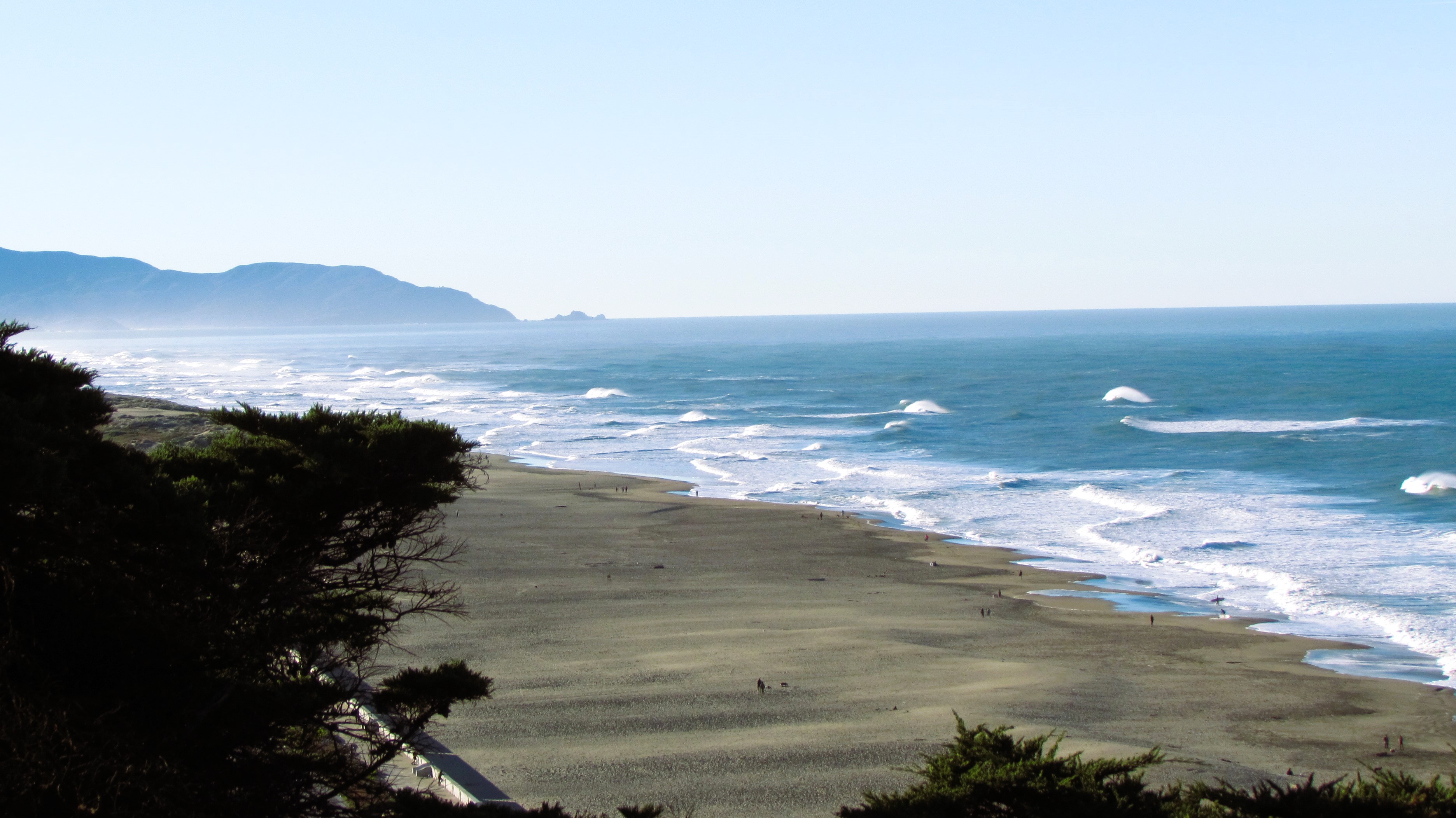 Surfers catching waves in January!