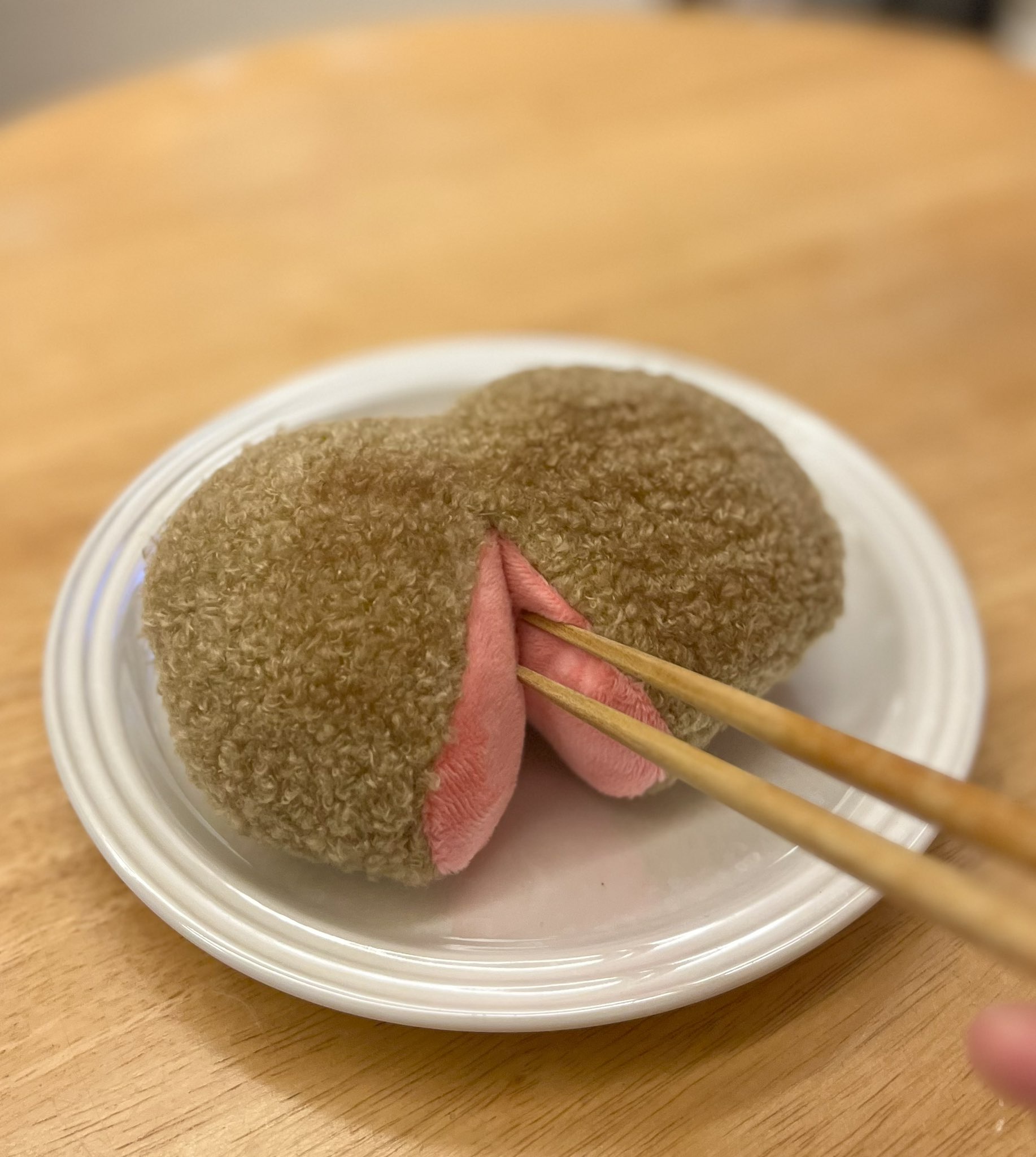 A Plush Toy Hamburger Steak That Looks Undercooked Inside