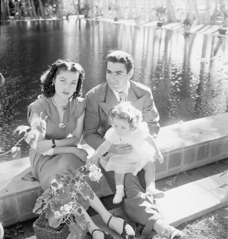 A Glimpse of Queen Fawzia of Iran with the Shah and Princess in Tehran, 1942