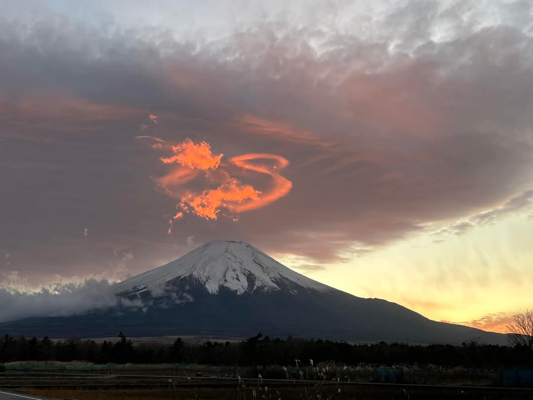 A Majestic Dragon Soars Above Mt. Fuji