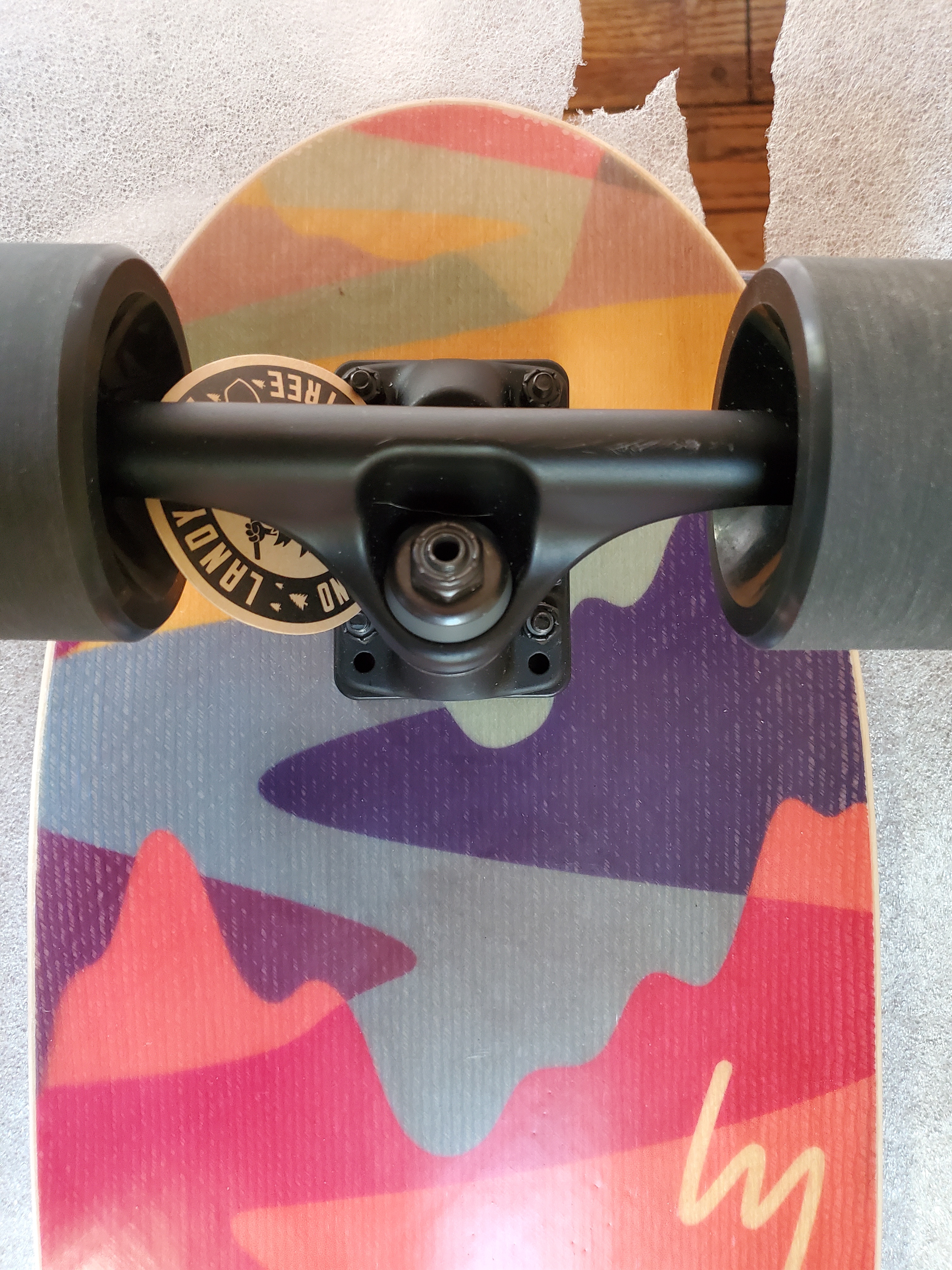 Examining the board's nose: those striking vertical lines and a curious green blemish