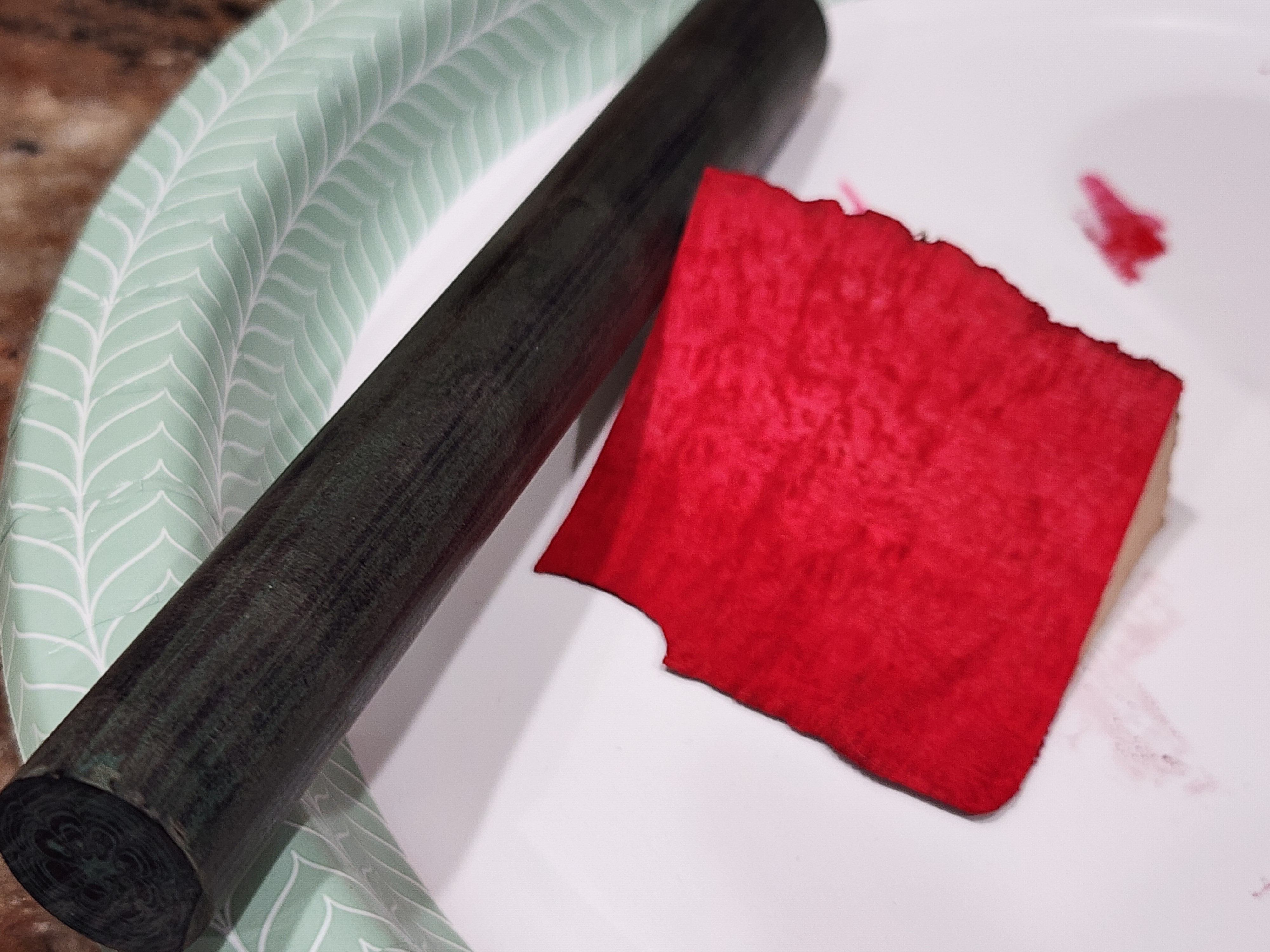 A briar stained with crimson