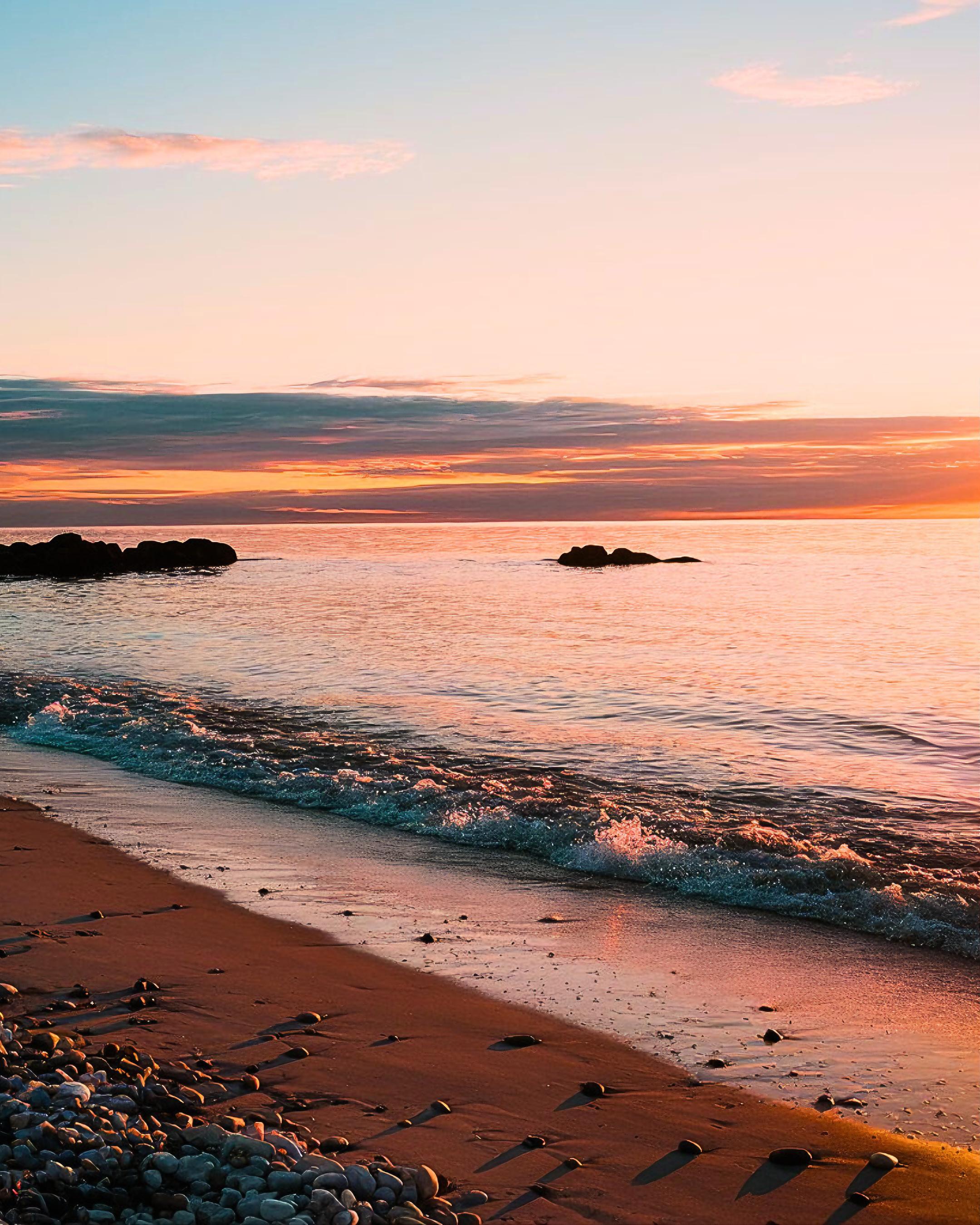 A Stunning Golden Sunset Over Tranquil Waters