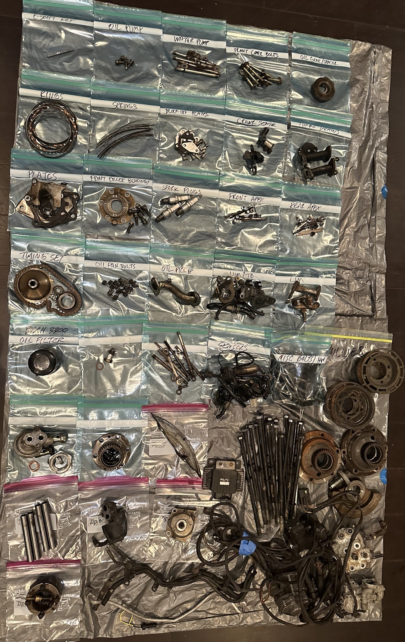 A Collection of 13b-rew Engine Parts and Miscellaneous Hardware