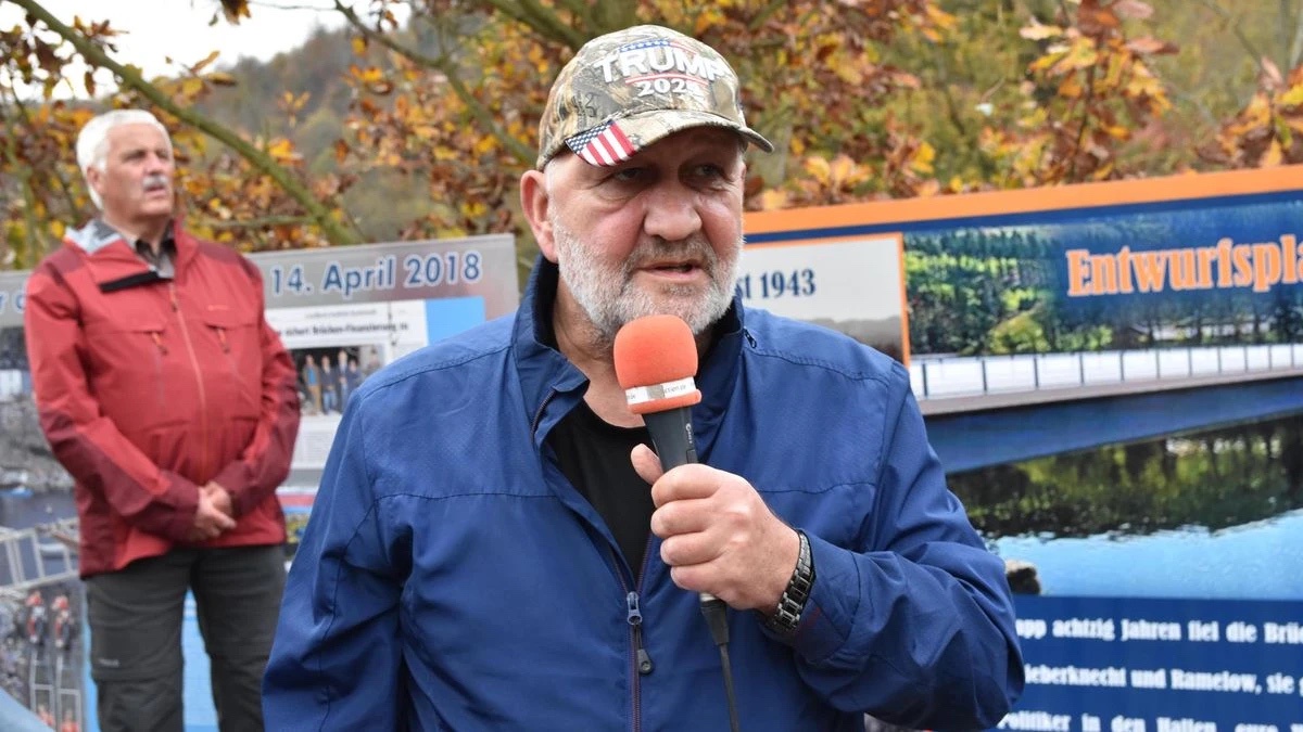 What’s a Former County Commissioner Doing in a Trump Hat?