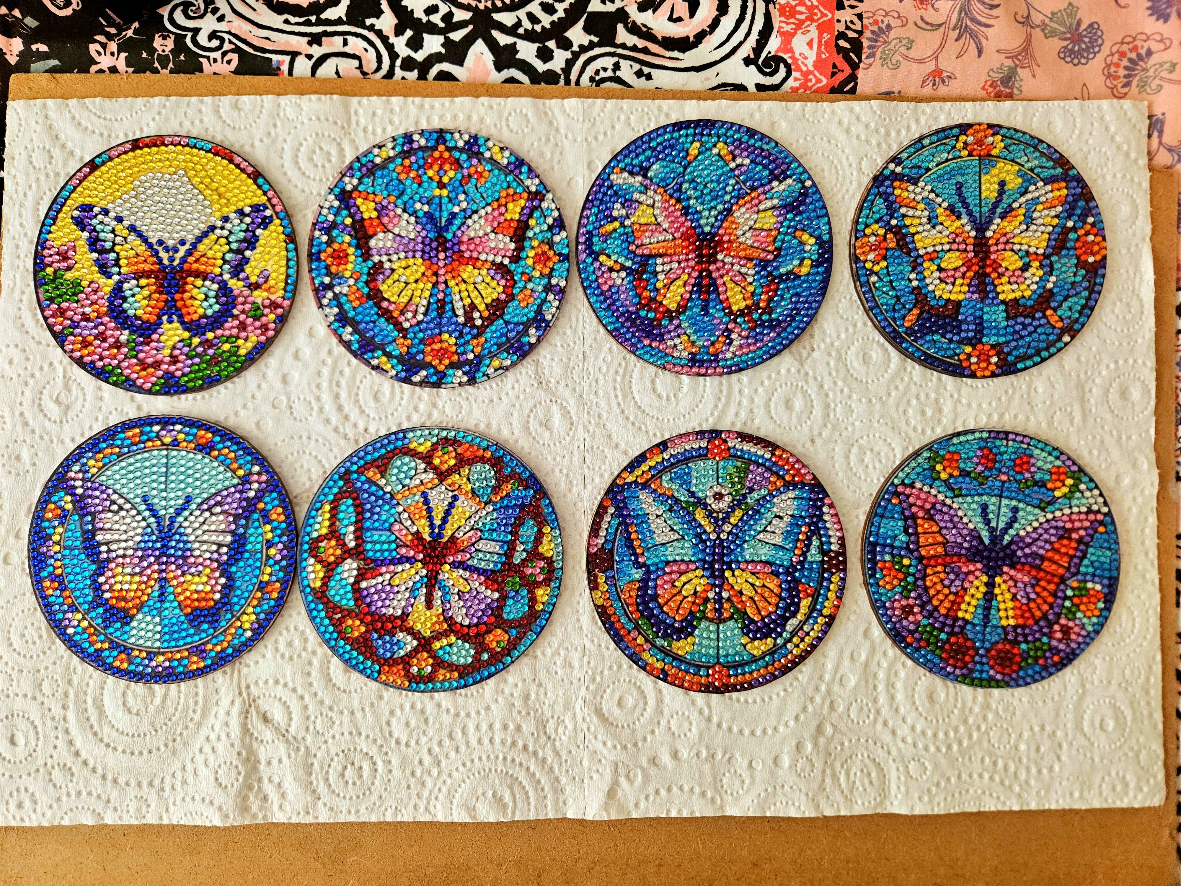 Beautifully crafted stained glass coasters featuring butterflies and flowers