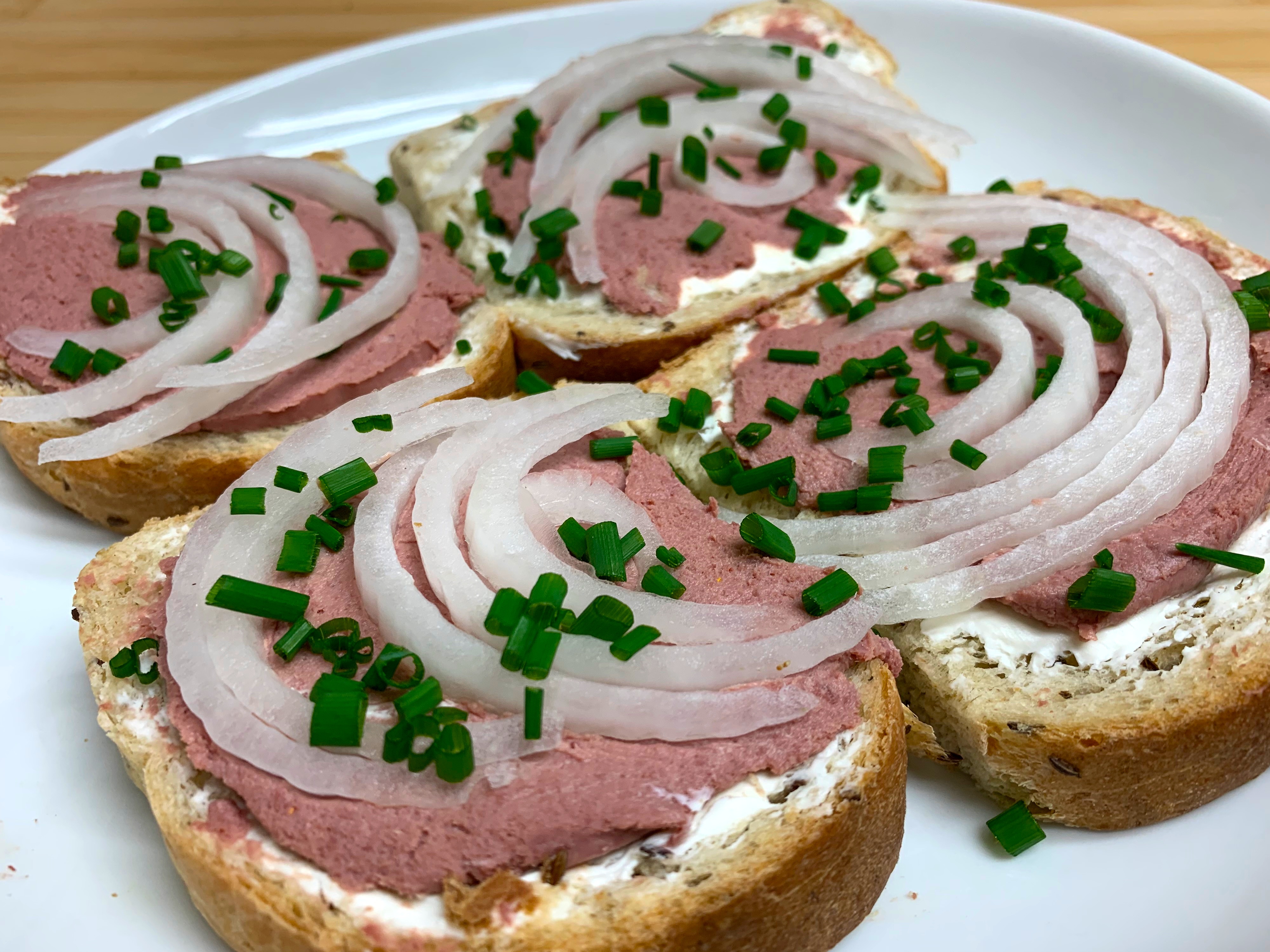 Indulging in Braunschweiger and Cream Cheese Delight with Onions and Chives on Rye