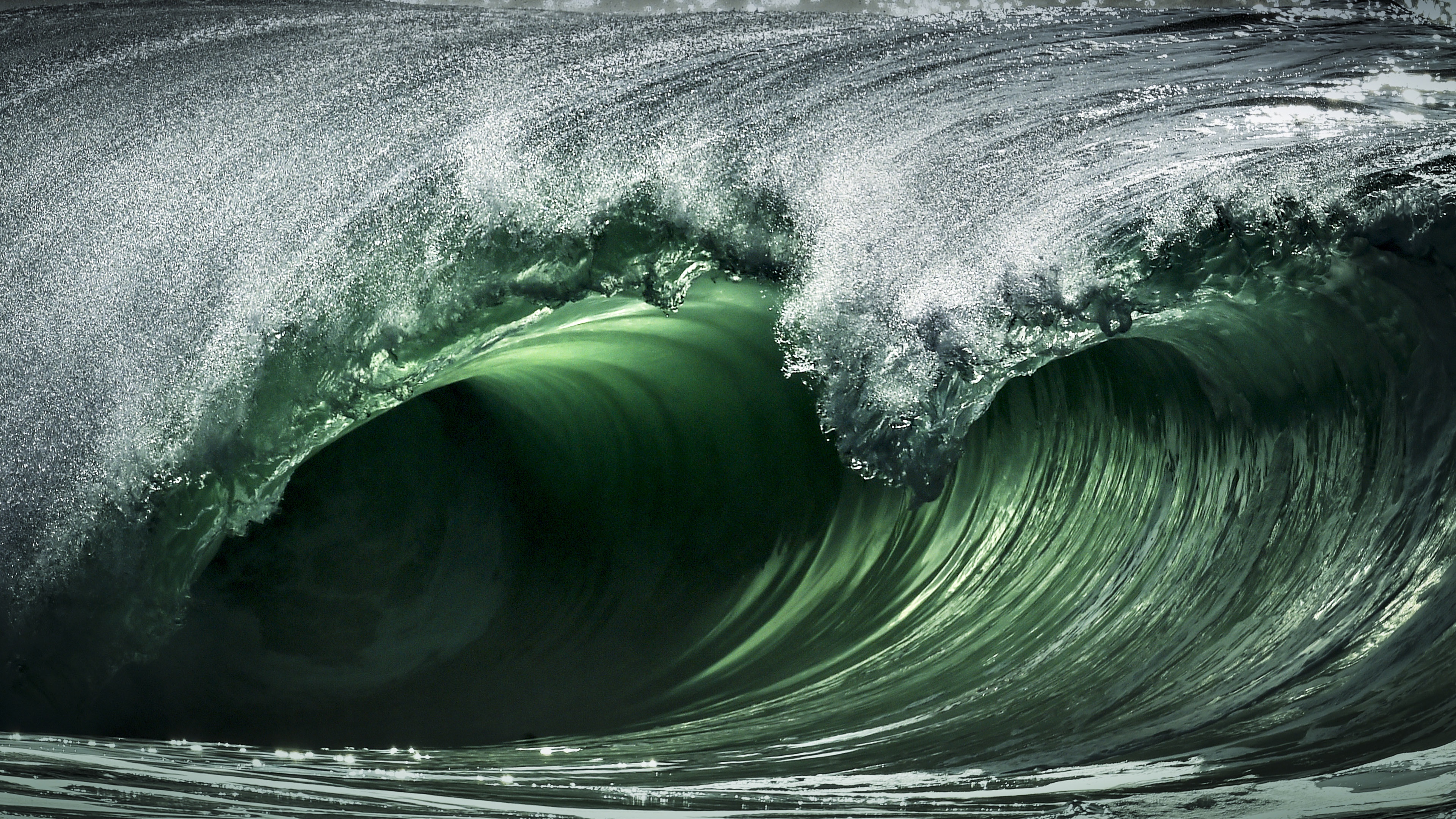 Serene Blue Waves Embracing a Lush Green Isle