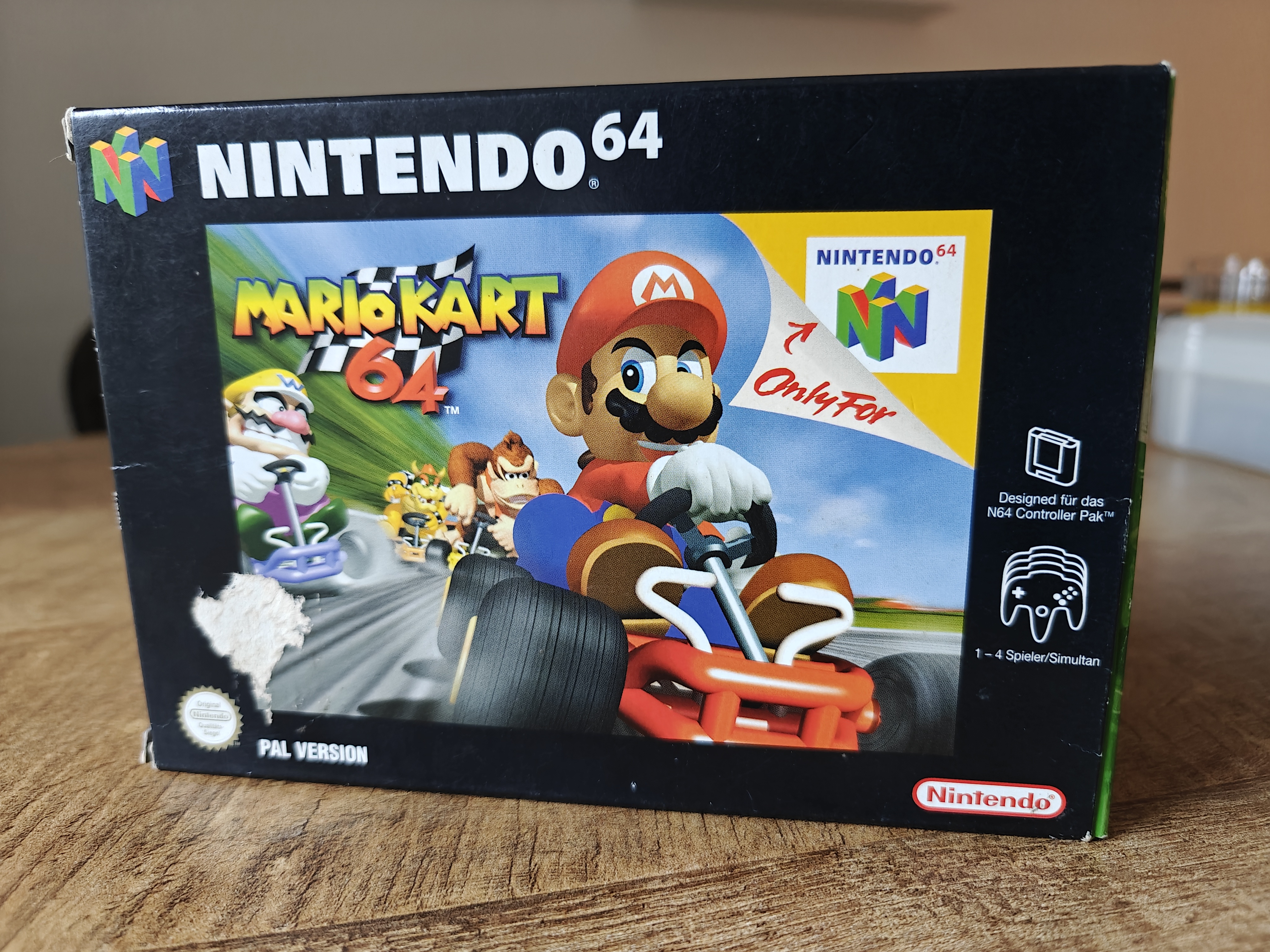 Discovered a rare gem: an untouched 90s N64 Mario Kart 64!
