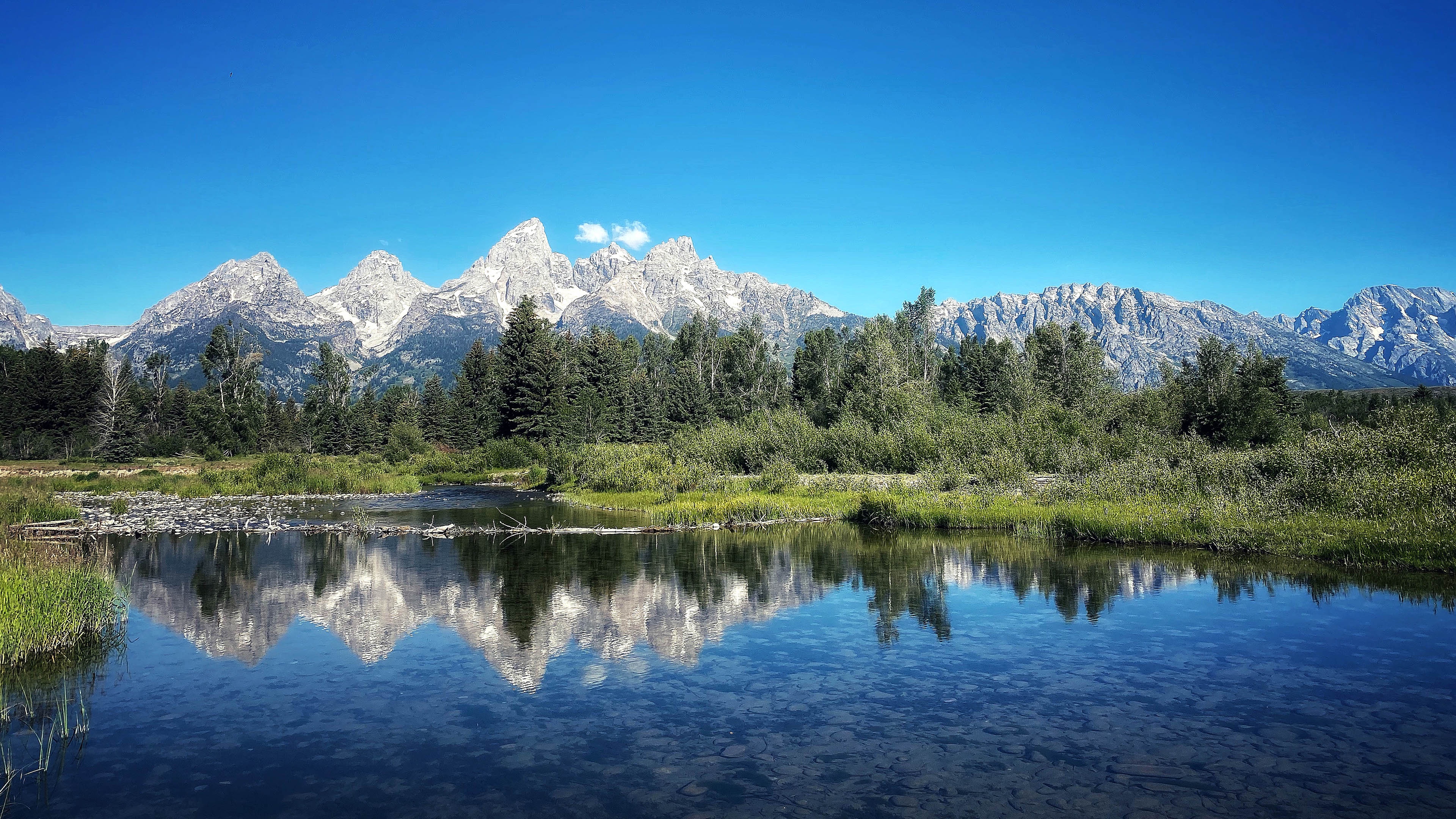 A Serene River Flowing Through the Landscape