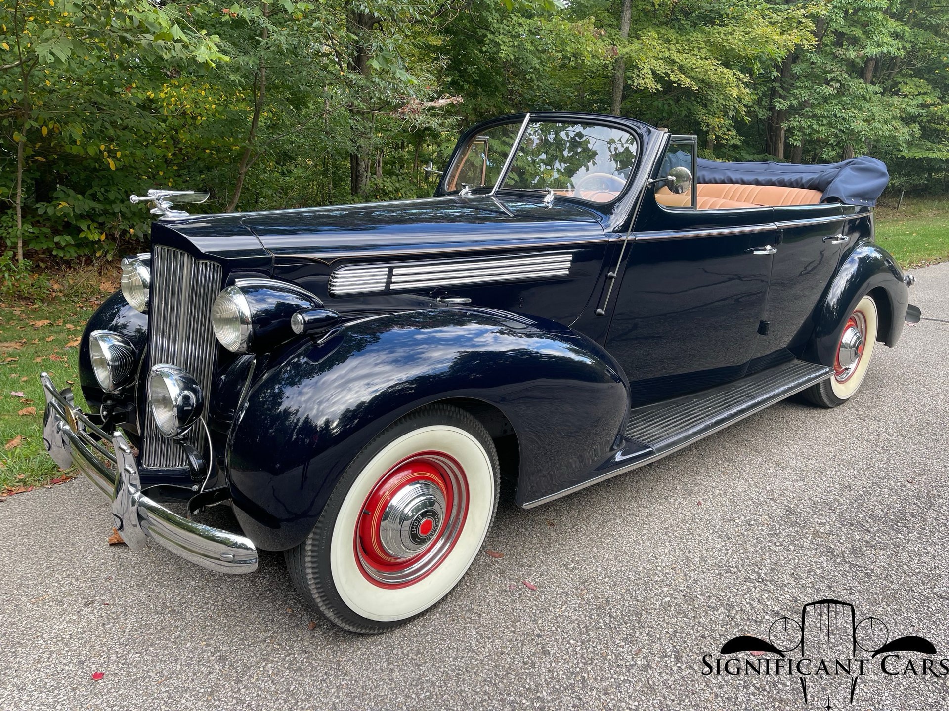 Carmen Sandiego's stylish ride: a classic 1939 Packard convertible.