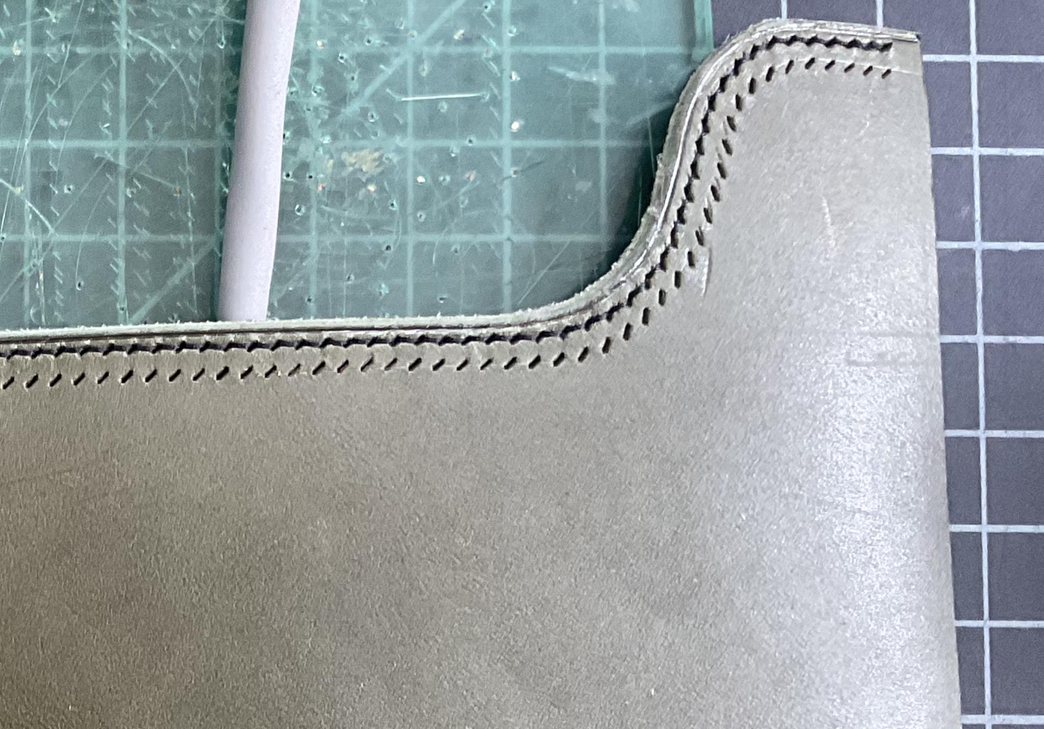 Stitching Progress: Before and After Hammering the Holes