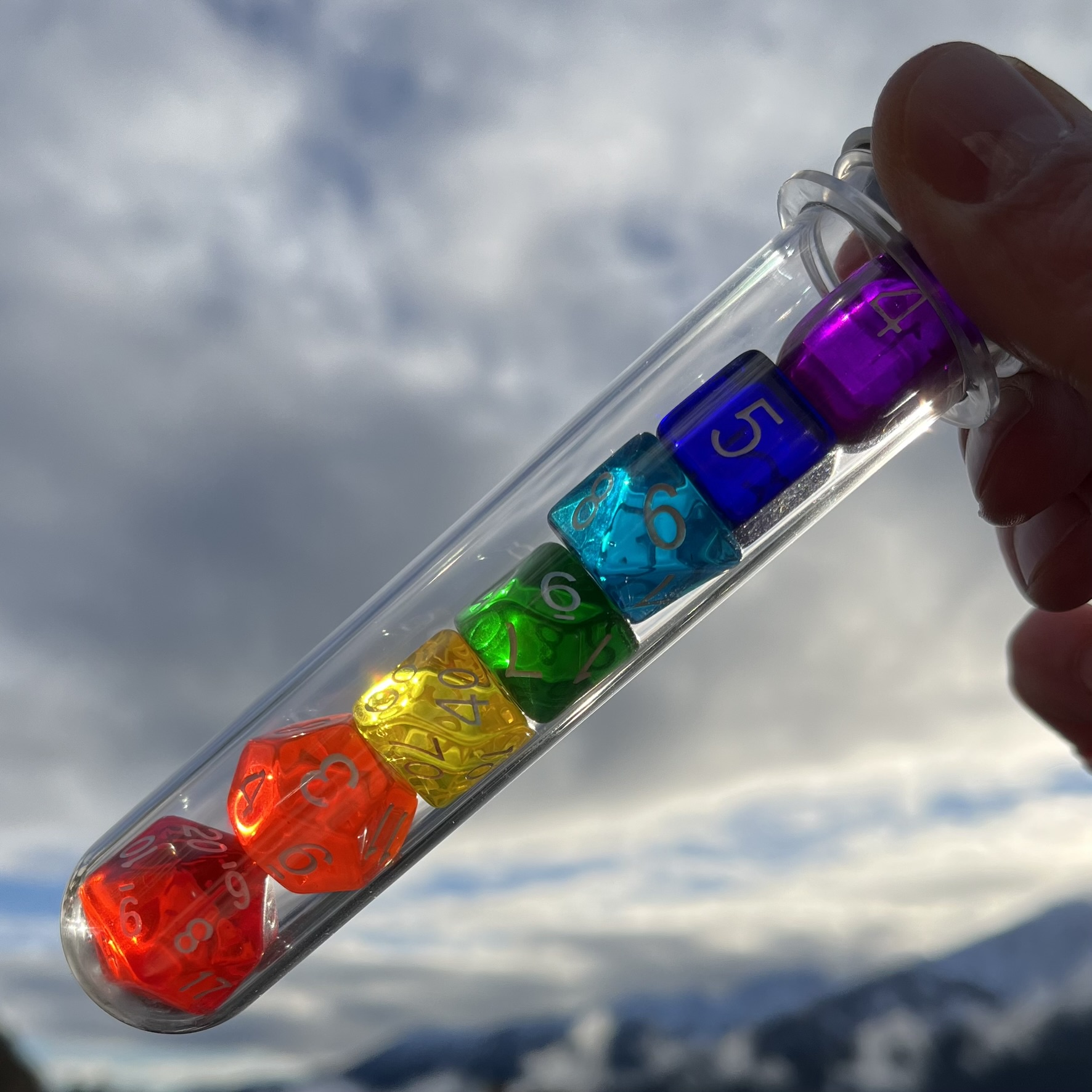 Check out this vibrant 'Roy G Biv' RPG dice set