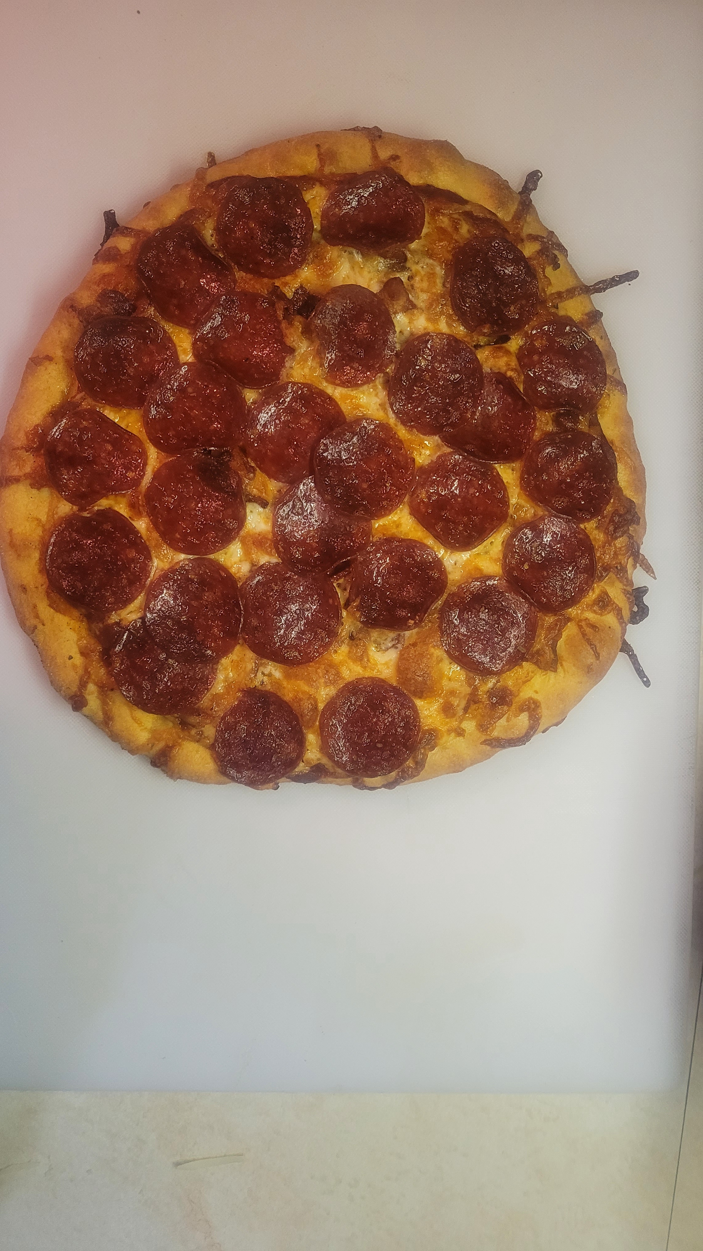 Ultimate Pizza Night: A Flavor Explosion with Pepperoni, Bacon, Provolone, Mozzarella, Oregano, and Basil