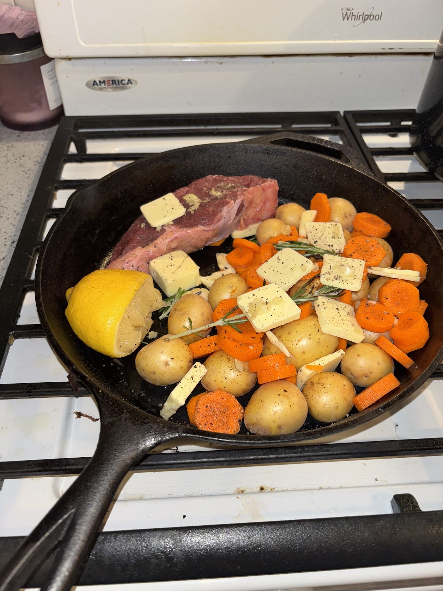 A Culinary Masterpiece: Steak, Potatoes, and Carrots in Garlic Butter with a Zesty Twist