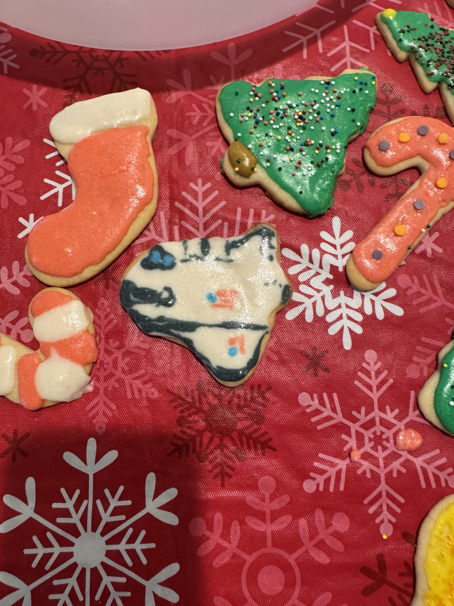 When You're Stuck Decorating a Mountain of Christmas Cookies