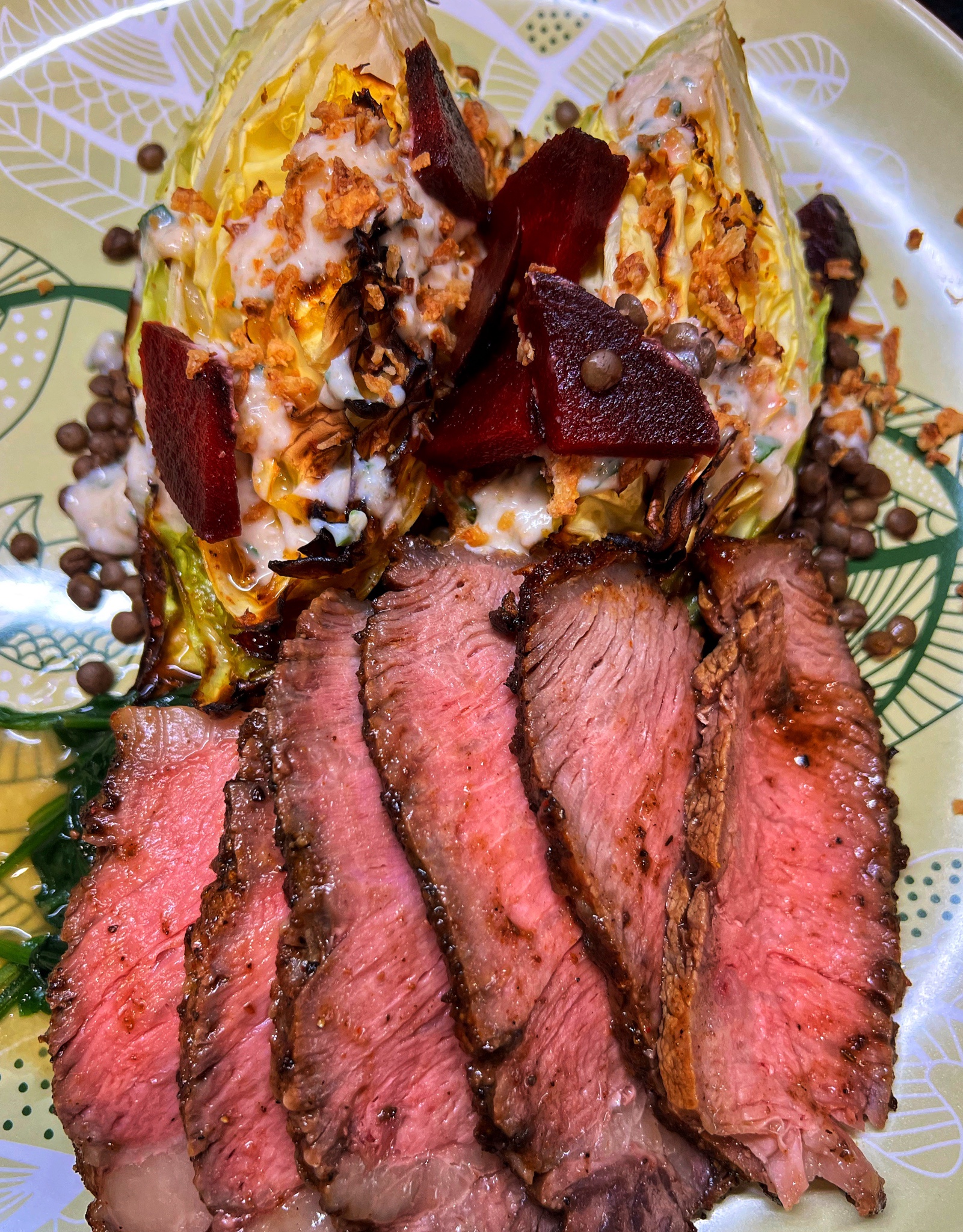 I whipped up a delicious tomahawk steak served with lentils, roasted cabbage, yogurt tahini dressing, and wilted spinach.