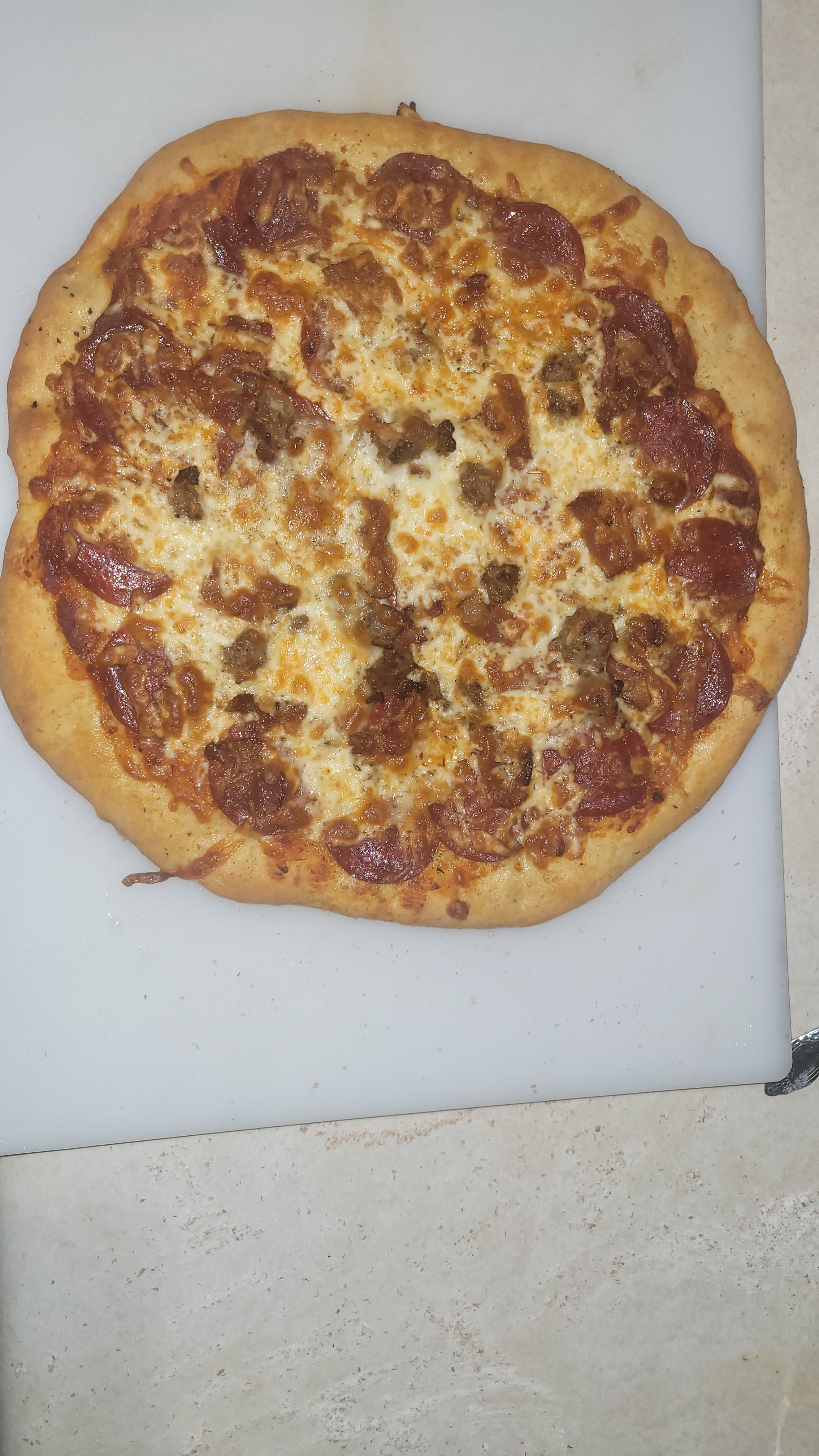 Pizza Night Extravaganza: Loaded with Pepperoni, Bacon, Sausage, Provolone, and Mozzarella!