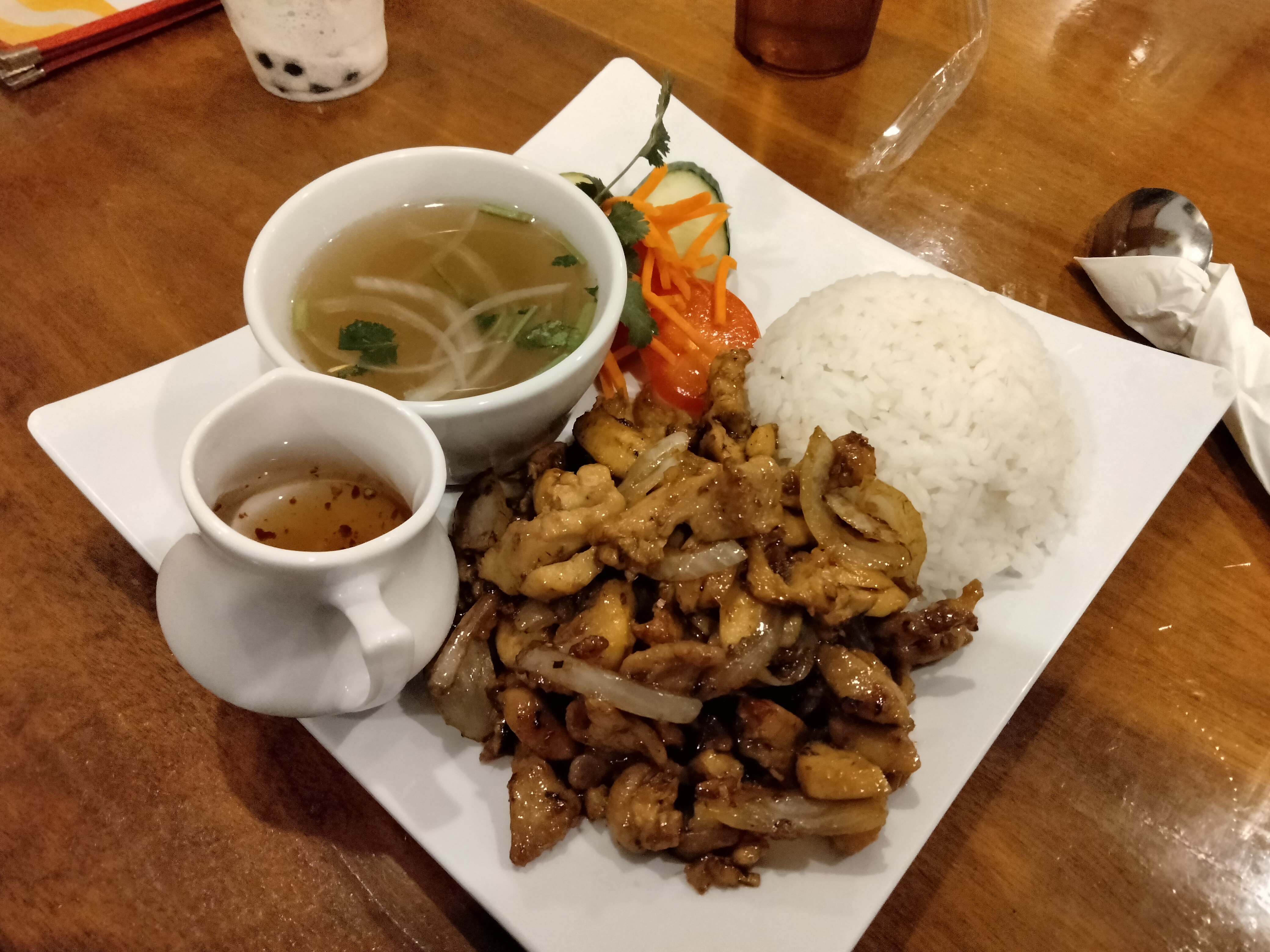 Delicious Sauteed Lemongrass Chicken Served with Rice and Veggies