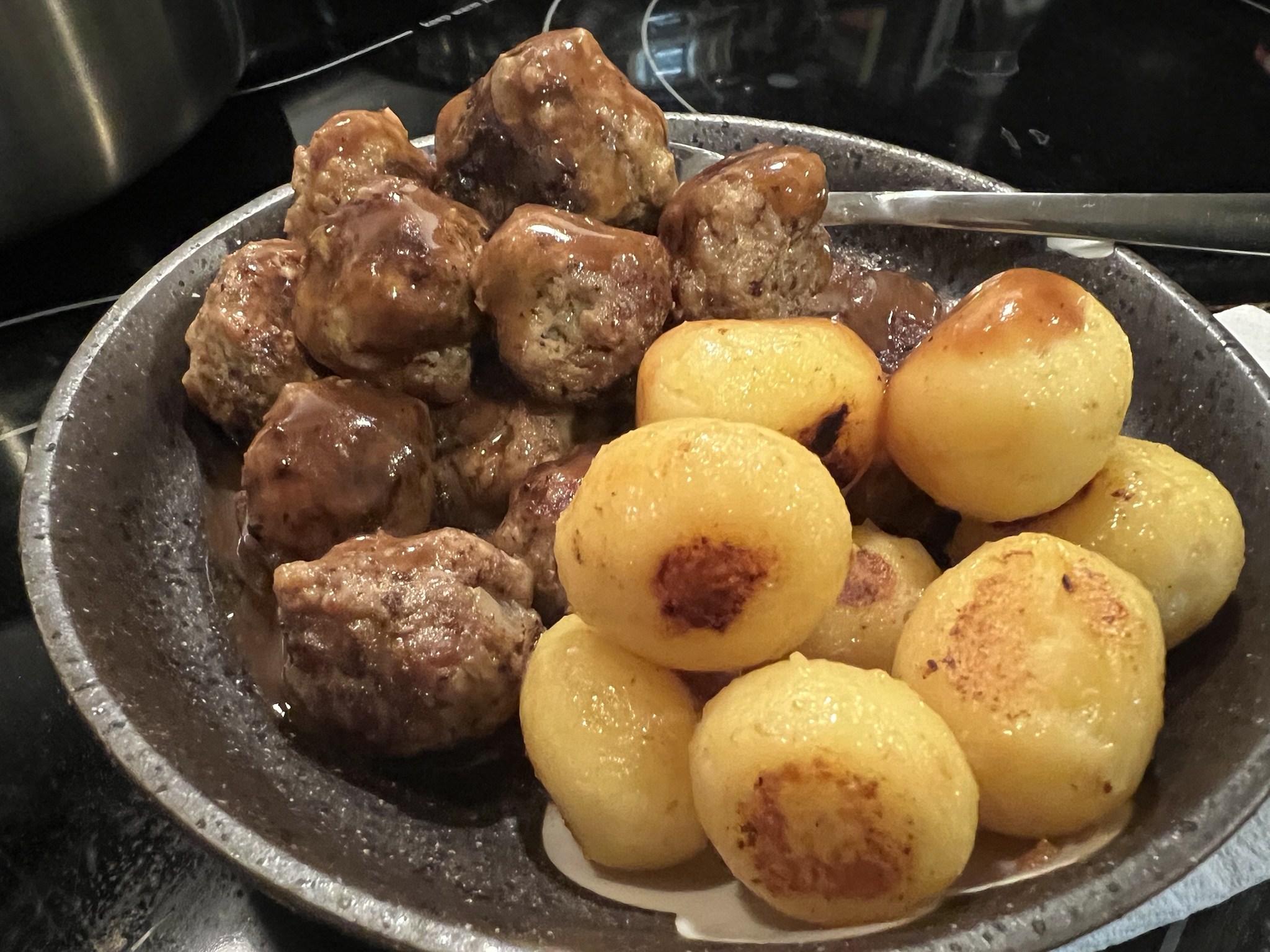 Savory Food Balls Drenched in Peppery Sauce