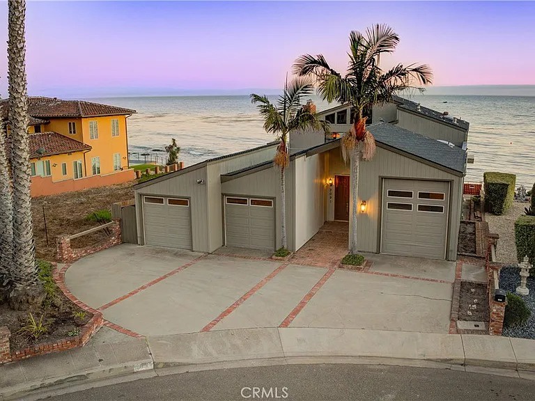 An $800,000 Price Drop Unveiled by a Cliffhanger in the Last Photo