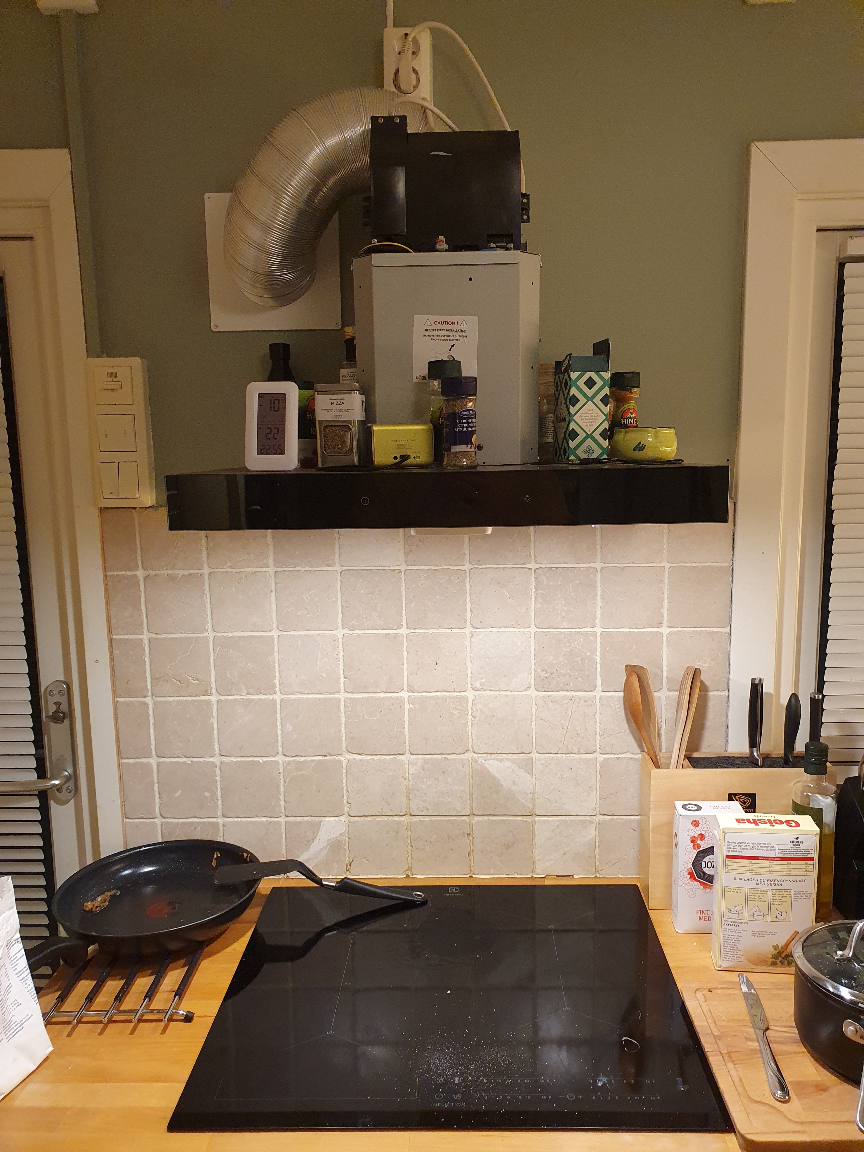 Keeping Cool: The Fan Above the Cooktop