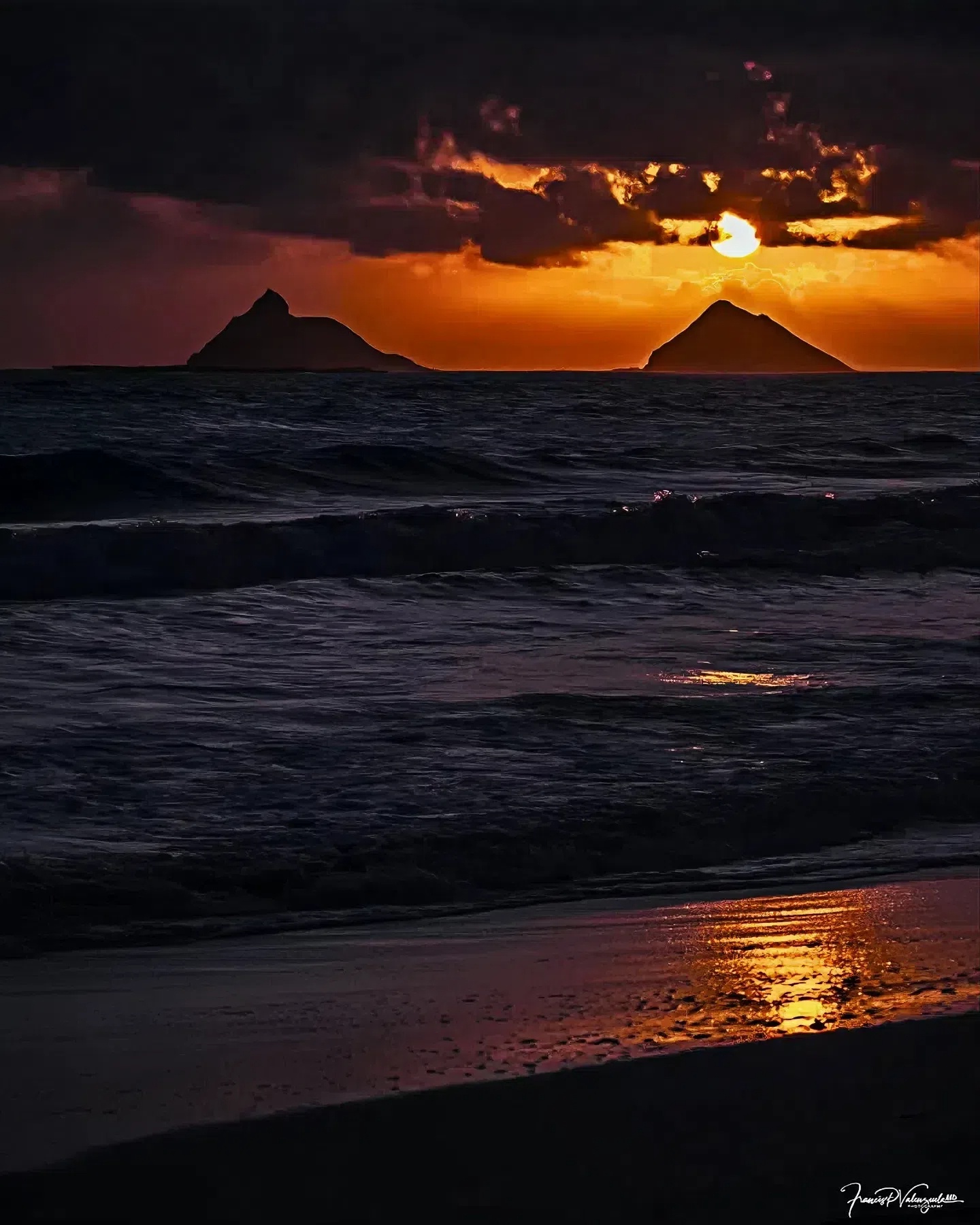 A Moody Sunset Over the Ocean with Golden Reflections